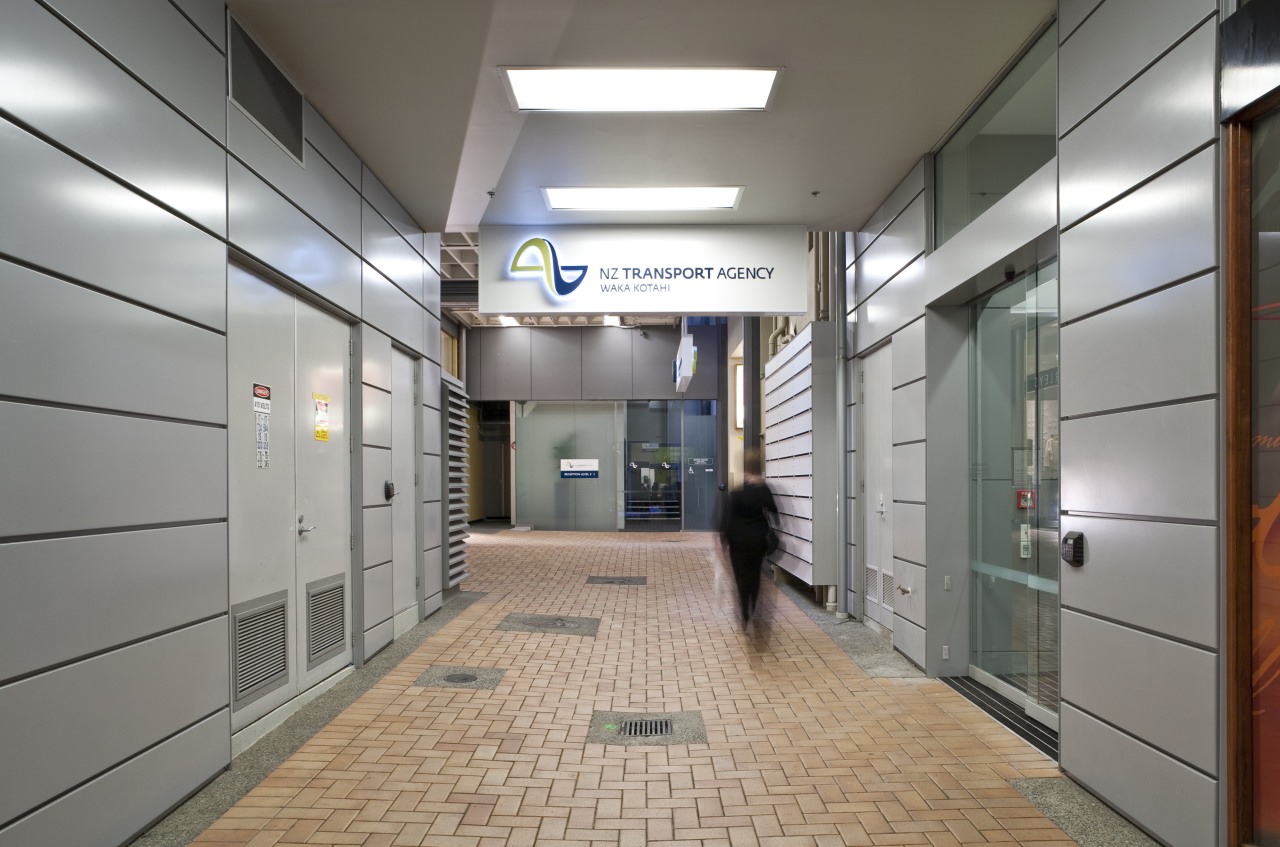 view of chews lane development,featuring pathed pathways,lighting,doors and lobby, gray