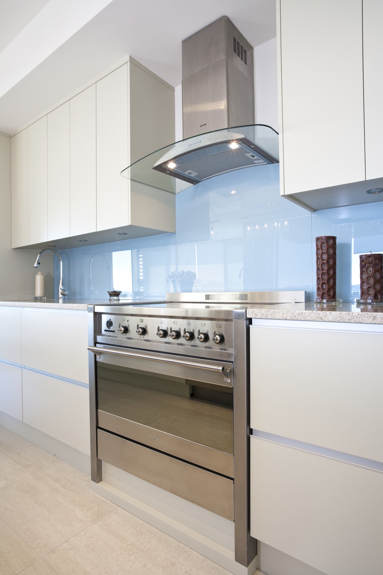 View of a kitchen which features Smeg appliances cabinetry, countertop, cuisine classique, home appliance, interior design, kitchen, kitchen stove, white