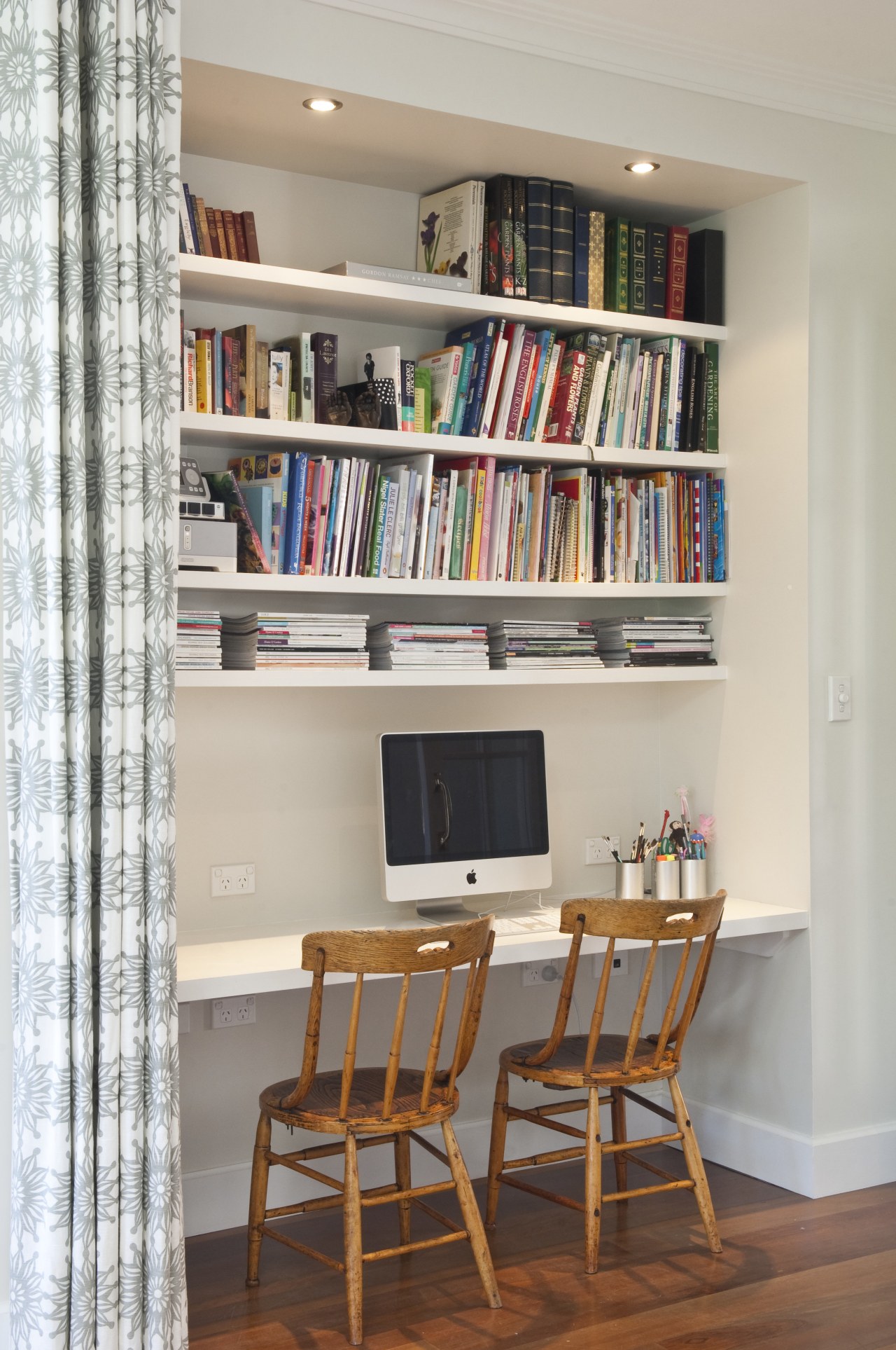 View of the extension to this 1930s home bookcase, cabinetry, chair, furniture, home, interior design, library, living room, room, shelf, shelving, wall, gray