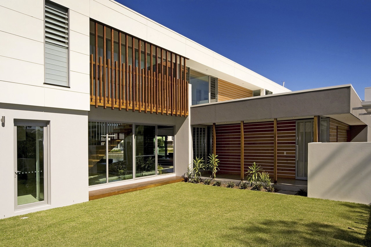 Exterior view of the front of this home architecture, elevation, estate, facade, home, house, property, real estate, residential area, roof, siding, window, brown