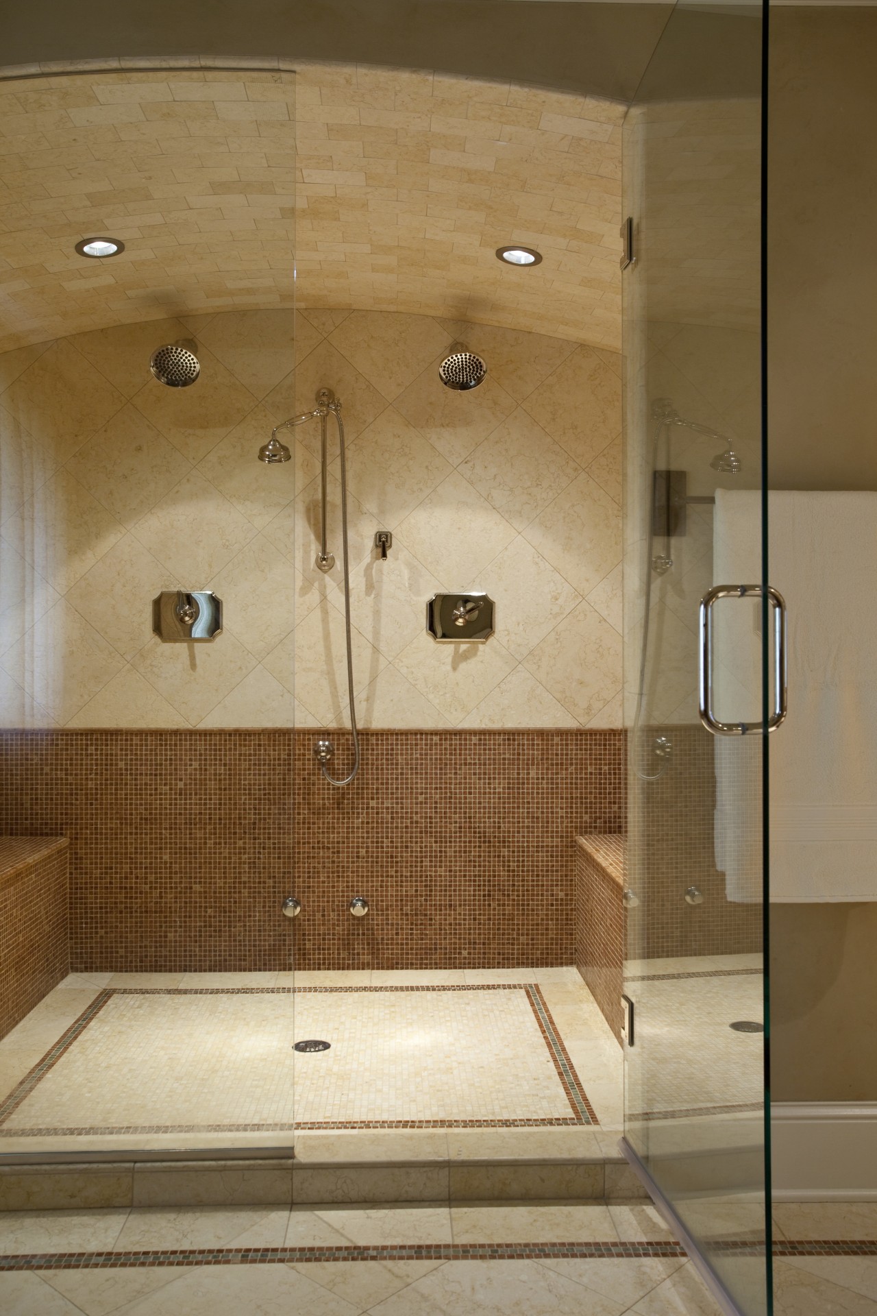 View of a bathroom which features shower enclosure architecture, bathroom, floor, interior design, plumbing fixture, room, shower, tile, brown, orange