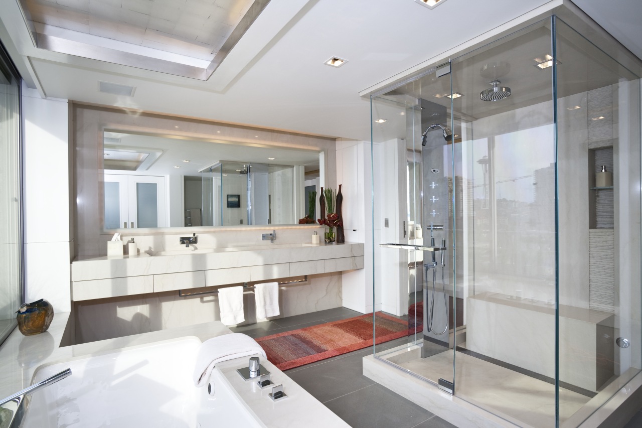 View of a bathroom which features glass shower bathroom, interior design, real estate, room, window, gray, white