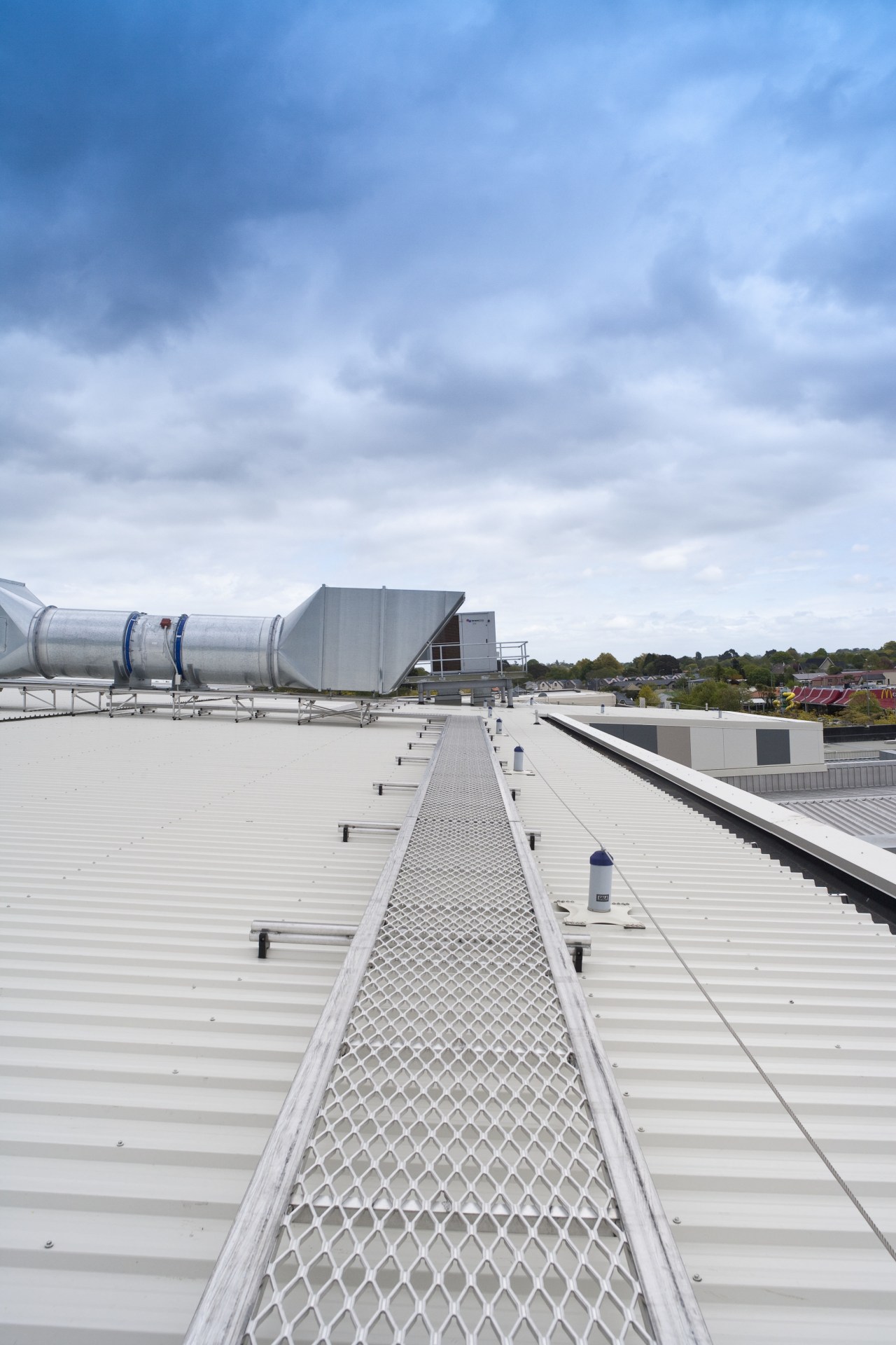 View of the Monkey toe platform on the architecture, building, cloud, daylighting, daytime, fixed link, line, outdoor structure, roof, sky, structure, white, teal