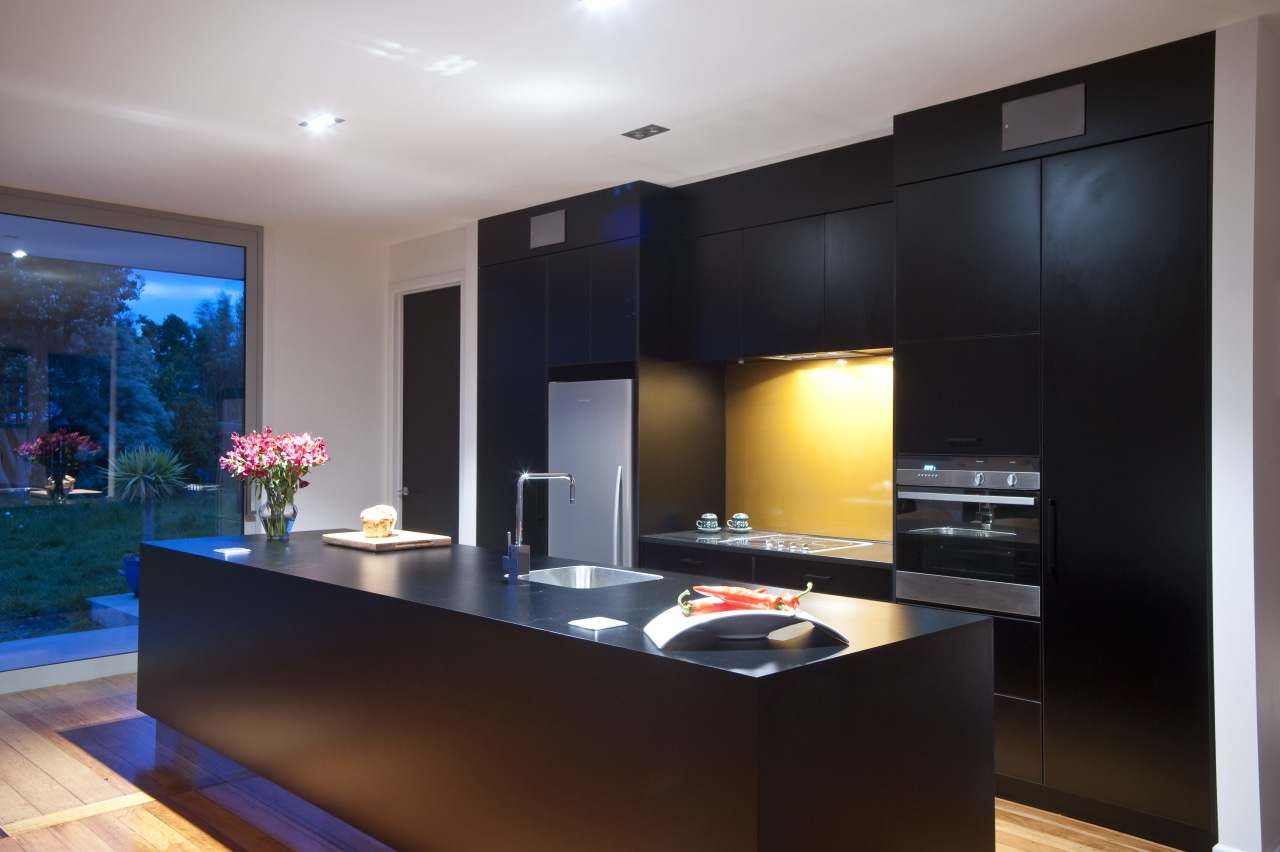 This new kitchen designed by Nicola Mason of ceiling, countertop, interior design, kitchen, lighting, real estate, room, black, gray