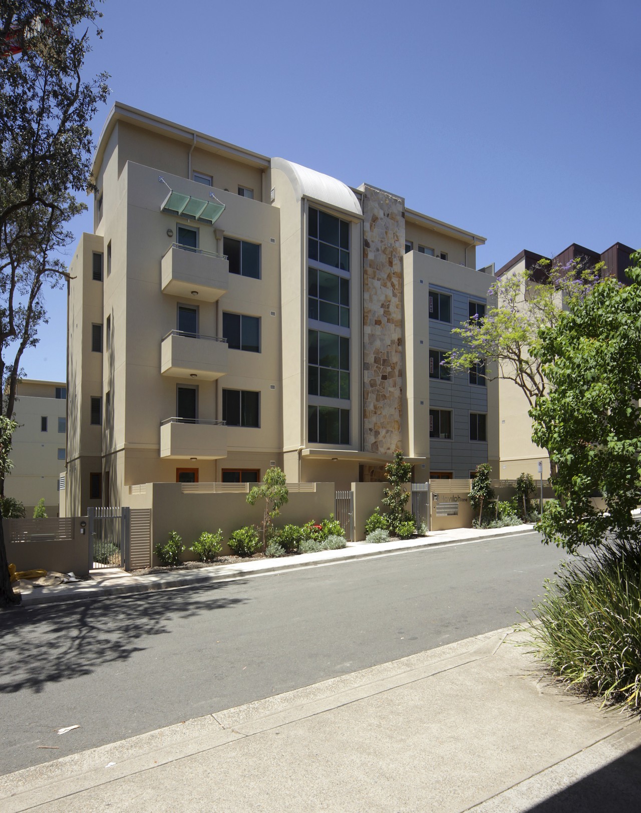 View of the new Linfield Apartments- a modern apartment, architecture, building, condominium, elevation, estate, facade, home, house, mixed use, neighbourhood, property, real estate, residential area, window, gray