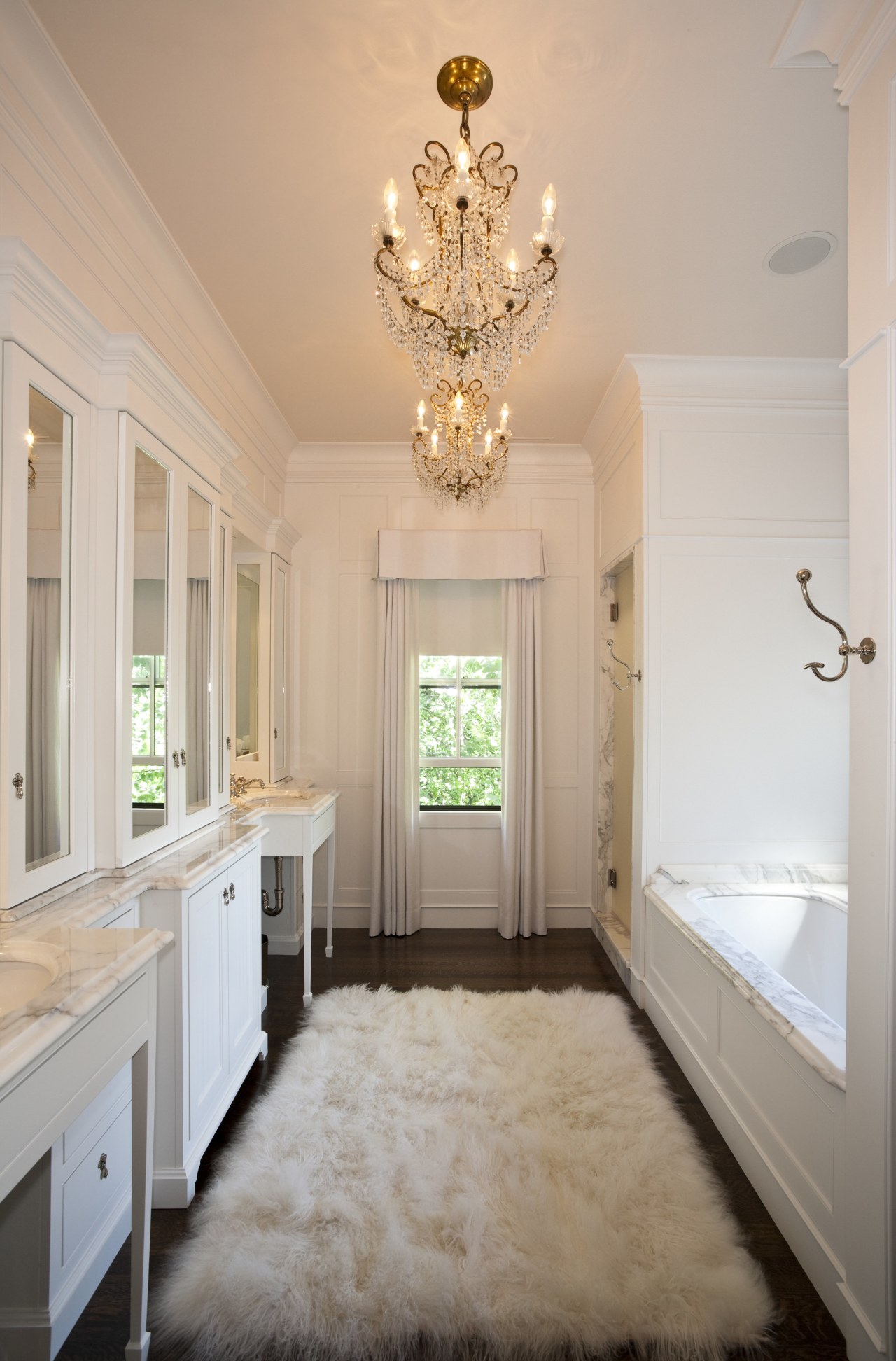 View of the master bathroom which features a ceiling, estate, floor, flooring, home, interior design, molding, room, wall, window, gray, orange