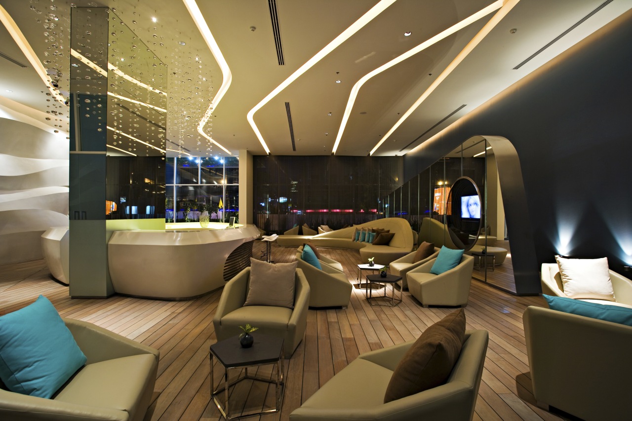 View of hotel check in area with bar ceiling, interior design, lobby, brown