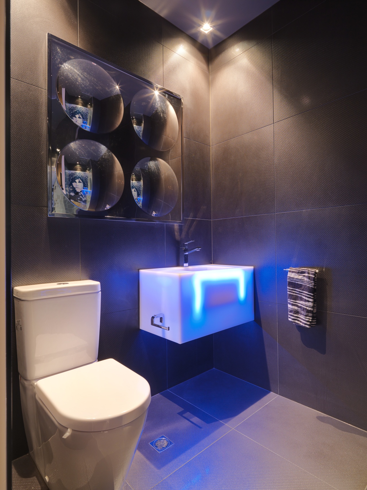 View of a themed bathroom with feature wall bathroom, ceiling, interior design, lighting, room, black