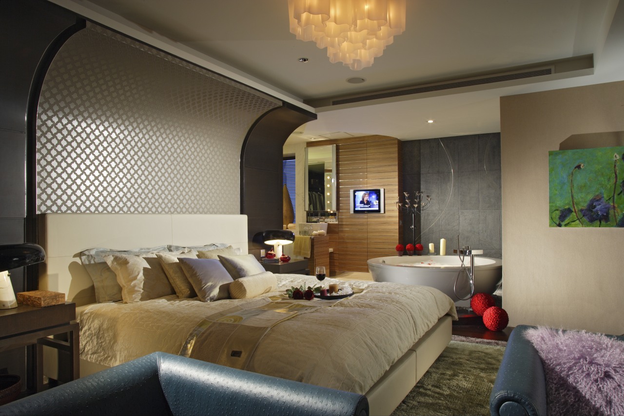 View of bedroom which features a bed with bedroom, ceiling, home, interior design, real estate, room, suite, wall, brown