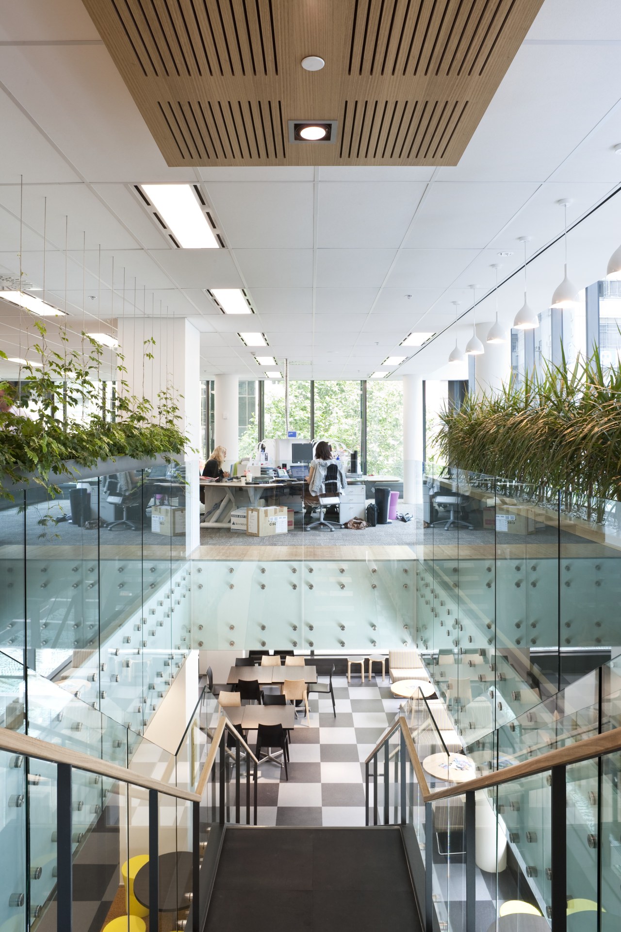 The offices of BNZ feature a combination of architecture, building, ceiling, condominium, daylighting, glass, interior design, lobby, mixed use, gray, white