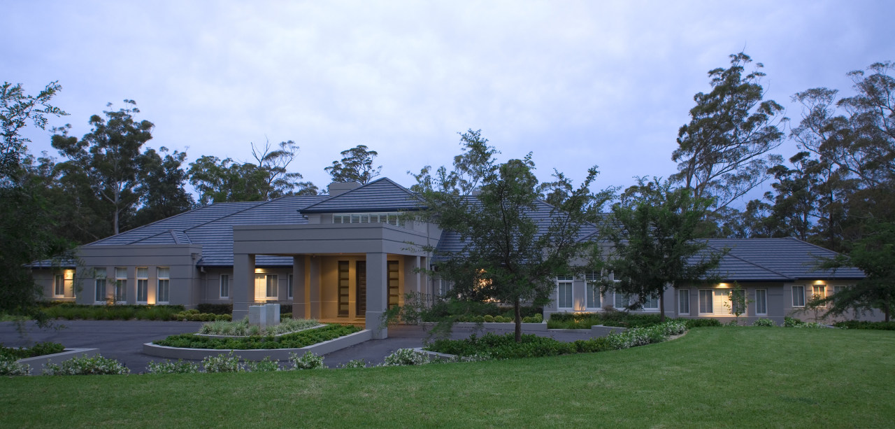 Exterior view of a country home designed and cottage, estate, facade, farmhouse, grass, home, house, landscape, mansion, plantation, property, real estate, residential area, roof, sky, villa, teal