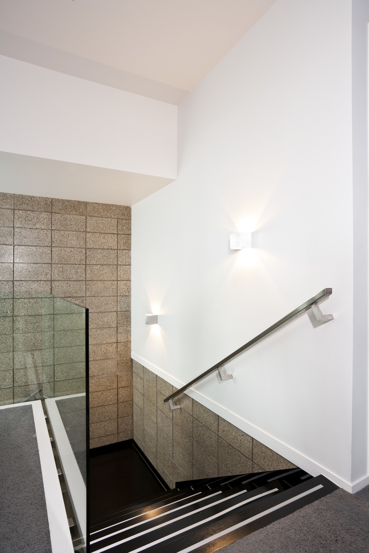 View of a stairway with glass balustrade and angle, architecture, bathroom, ceiling, daylighting, floor, glass, handrail, home, house, interior design, room, wall, white