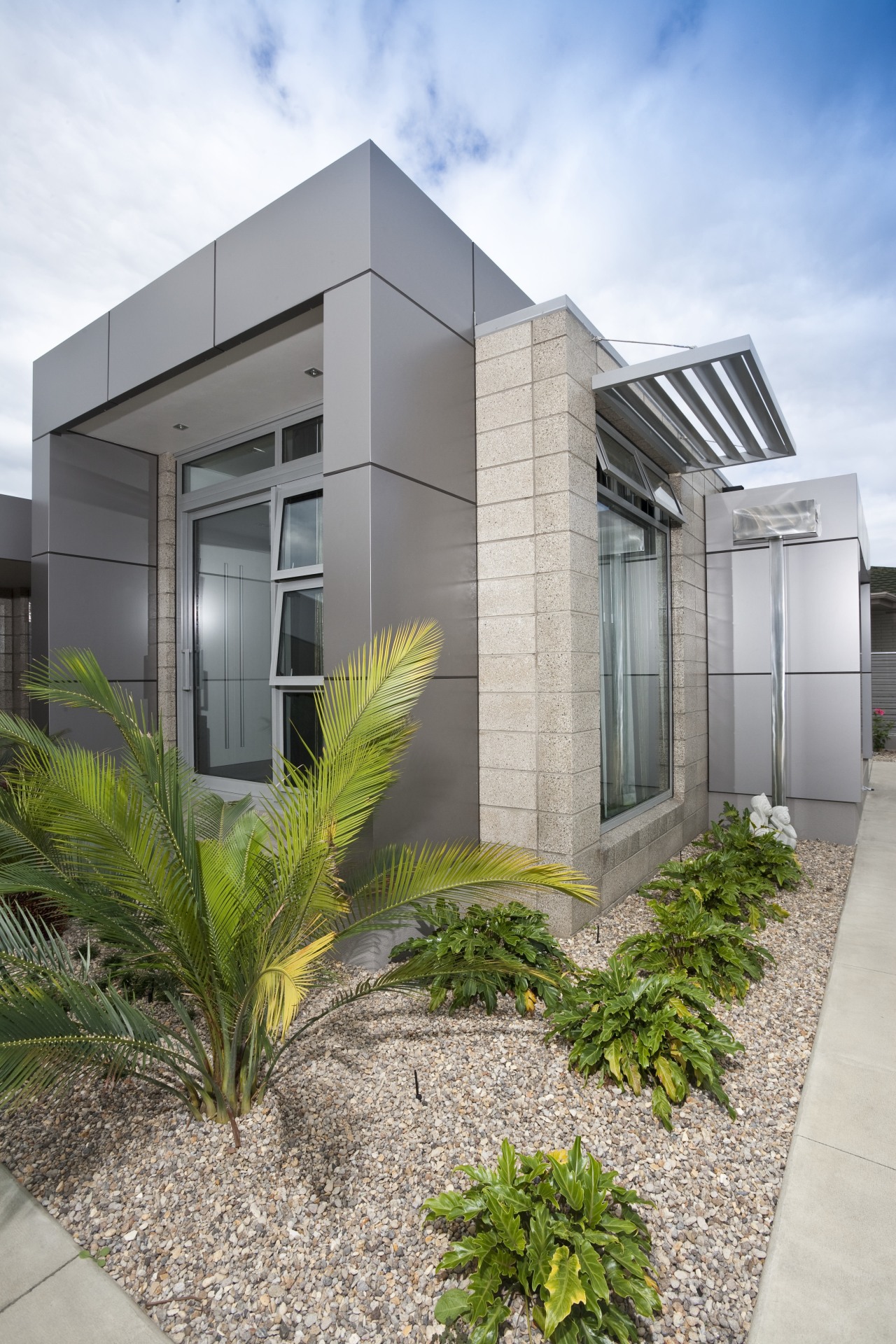 Exterior view of a home built by Gene architecture, building, corporate headquarters, facade, home, house, property, real estate, residential area, gray