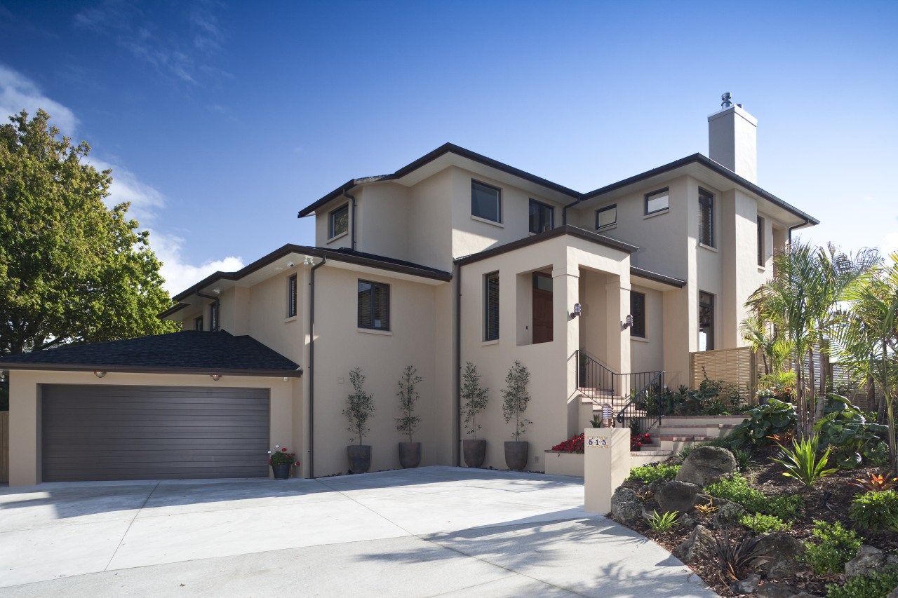 Exterior view of a home designed by Town building, elevation, estate, facade, home, house, neighbourhood, property, real estate, residential area, sky, villa