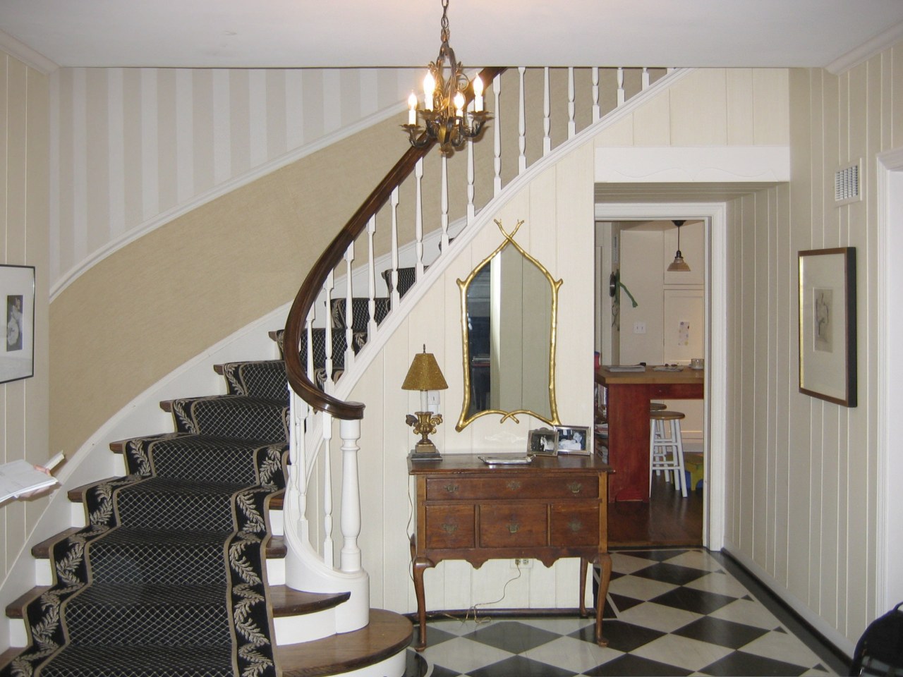 View of the stairway in this traditional house baluster, ceiling, floor, flooring, handrail, home, interior design, real estate, room, stairs, wall, gray