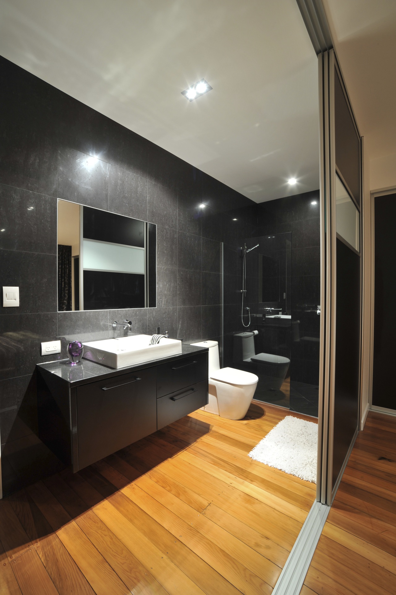 Contemporary bathroom with pre-finished decorative panel 'Formica Melteca' architecture, bathroom, ceiling, countertop, floor, flooring, hardwood, interior design, laminate flooring, living room, room, wood flooring, black, gray