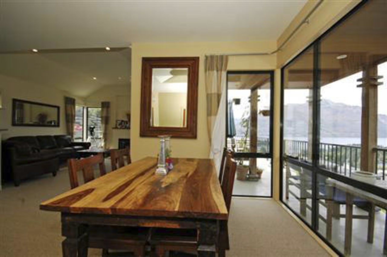 Overview of dining area with Timber Table ceiling, dining room, floor, flooring, interior design, living room, property, real estate, room, window, brown