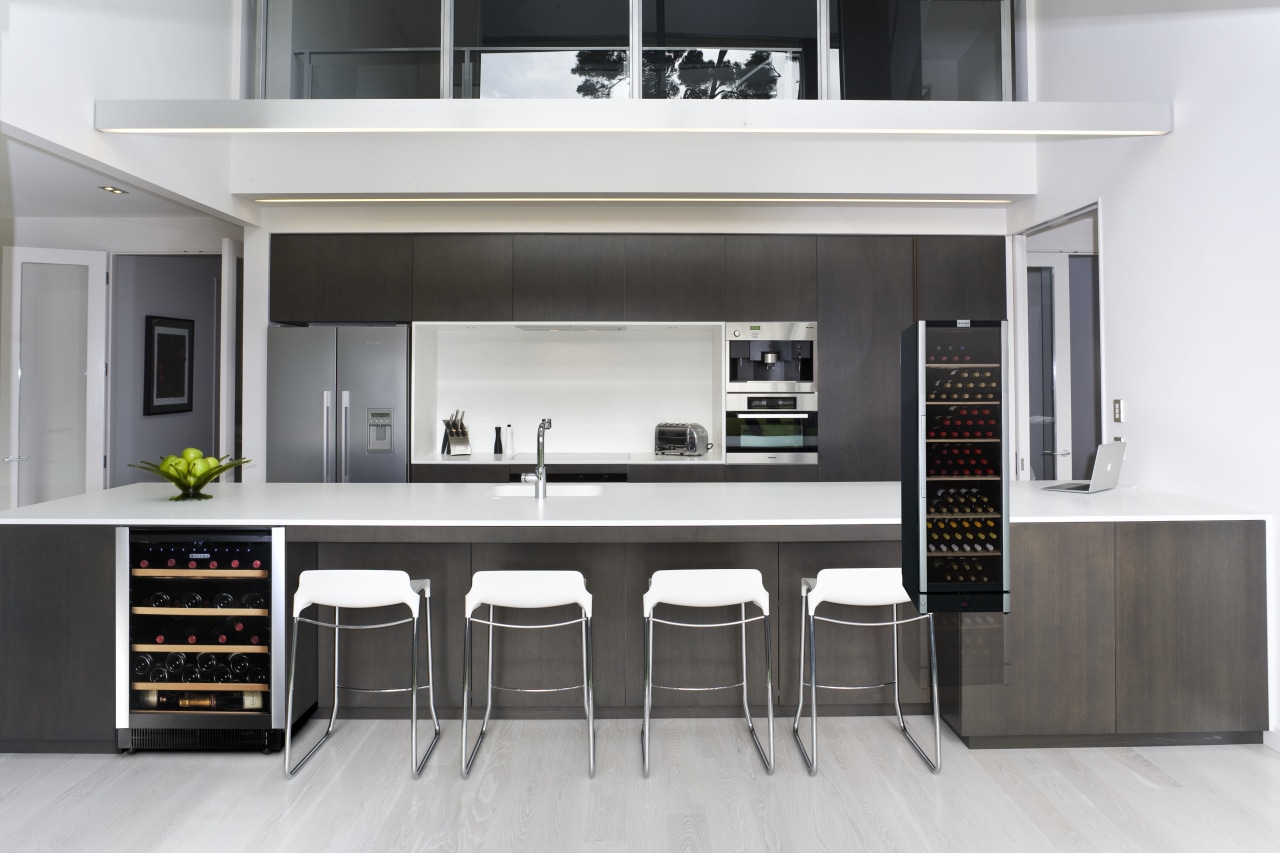 View of a kitchen which features a Vintec countertop, furniture, interior design, kitchen, product design, white, black