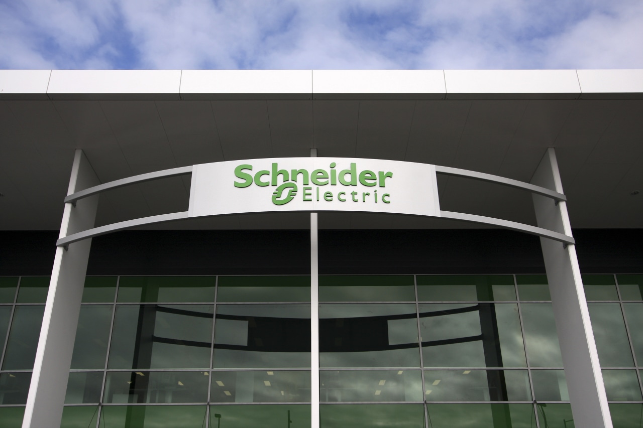 Exterior view of the Schneider Electrical head office building, corporate headquarters, facade, signage, sport venue, structure, black