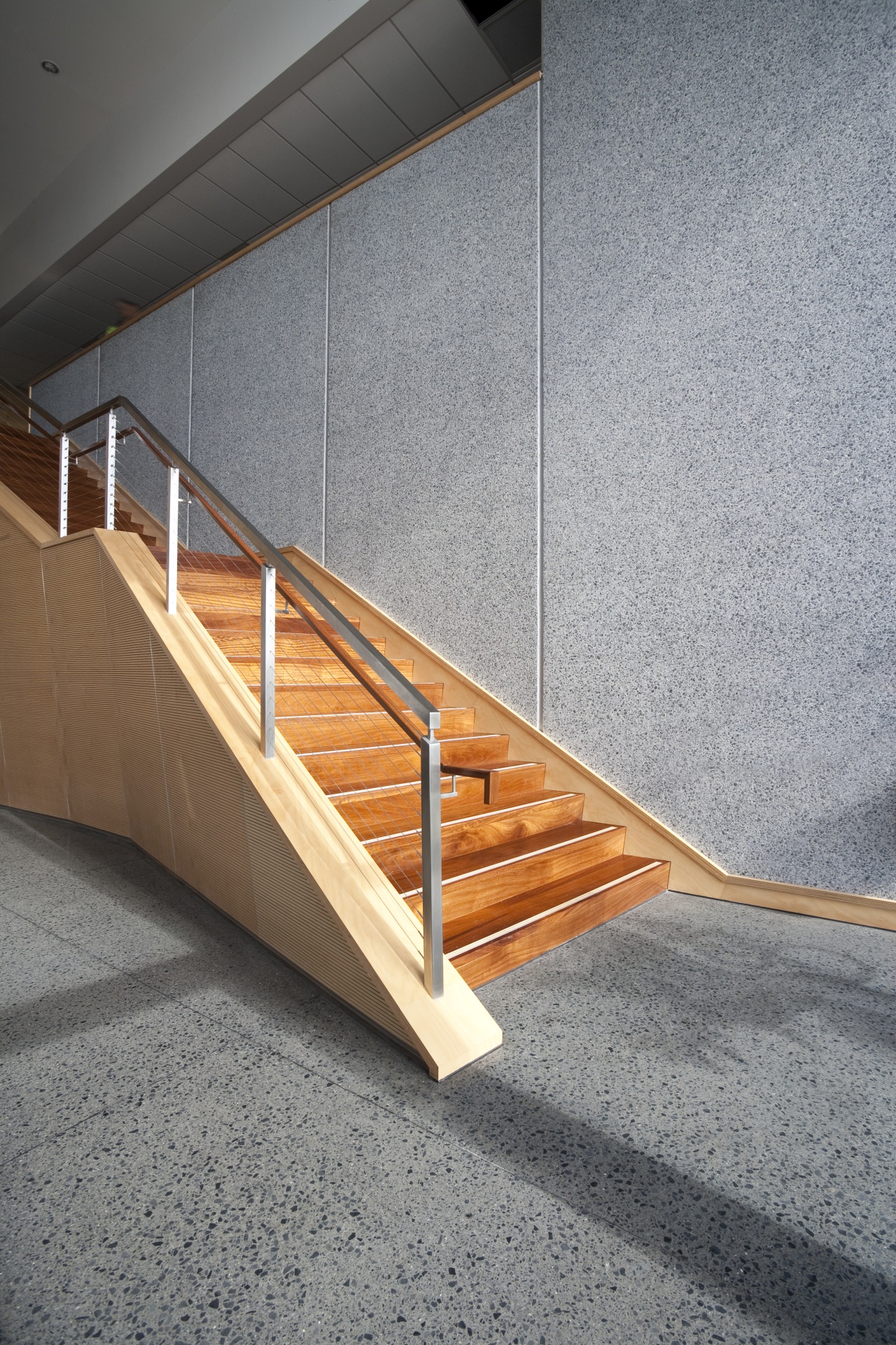 The new Lion Nathan brewhouse features concrete walls angle, architecture, daylighting, floor, handrail, line, product design, stairs, wood, gray