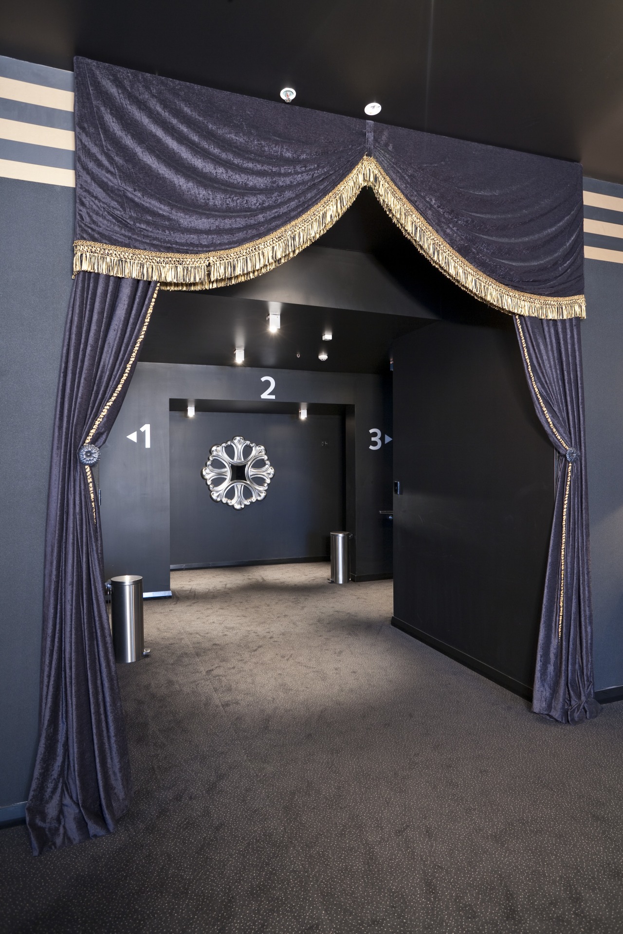 Interior view of an entrance to a cinema architecture, ceiling, interior design, structure, black, gray