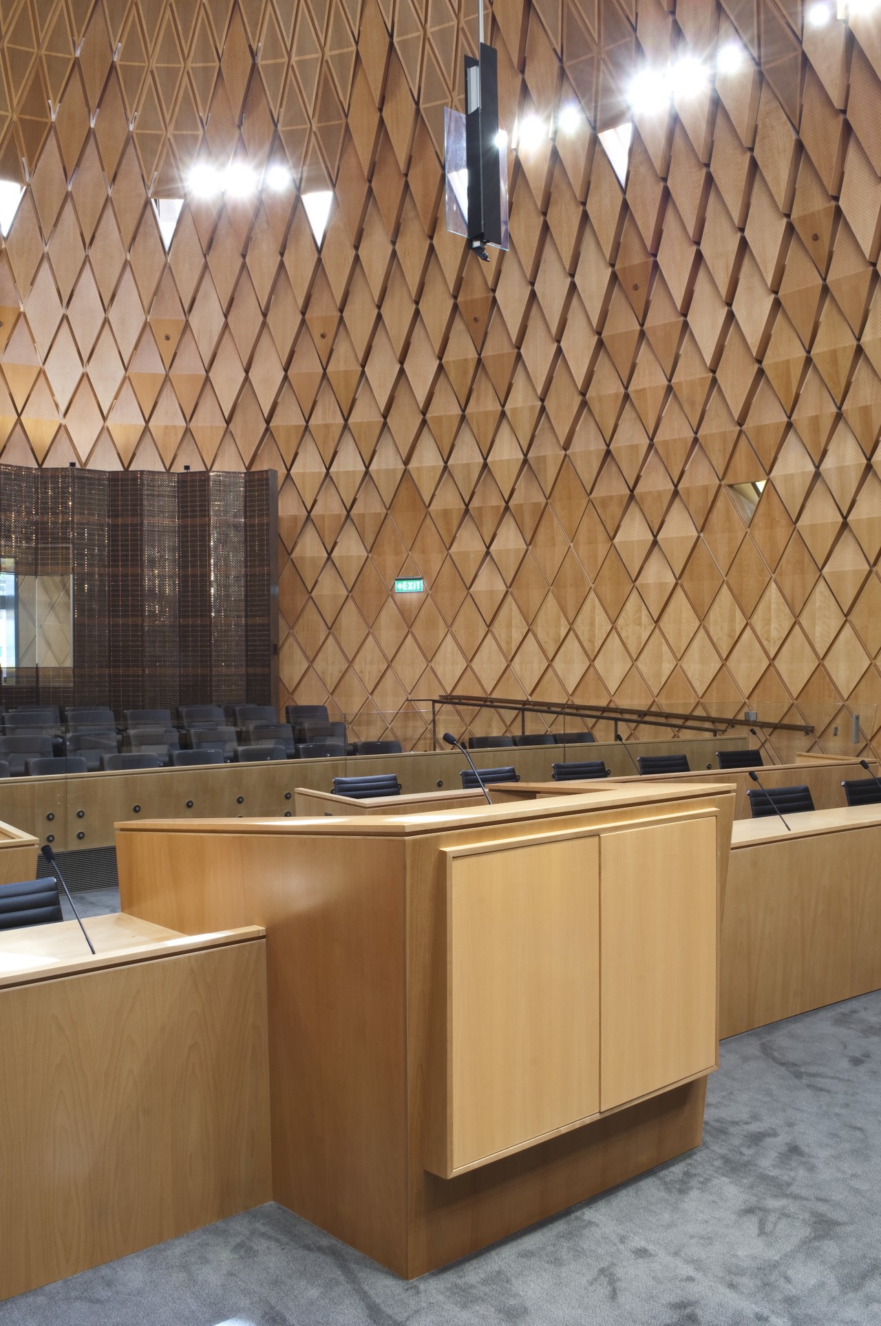 Interior view of the Supreme Court which features architecture, ceiling, countertop, daylighting, floor, flooring, hardwood, interior design, plywood, tile, wall, wood, brown, orange