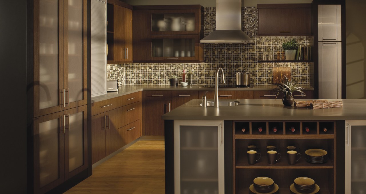 View of modern kitchen accessories in this traditional cabinetry, countertop, cuisine classique, interior design, kitchen, under cabinet lighting, brown, black