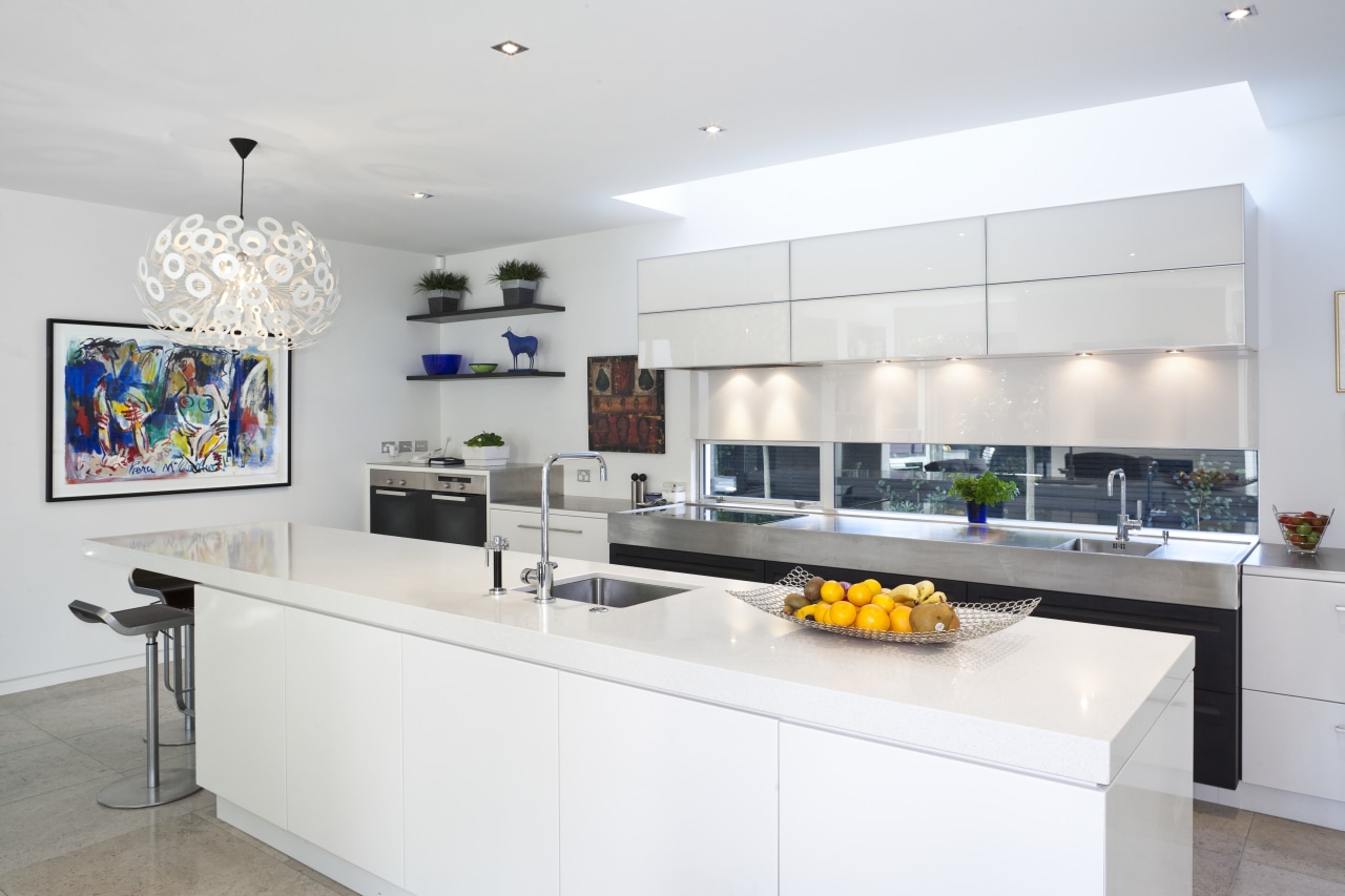 Modern kitchen features brilliant white panelling countertop, interior design, kitchen, real estate, white