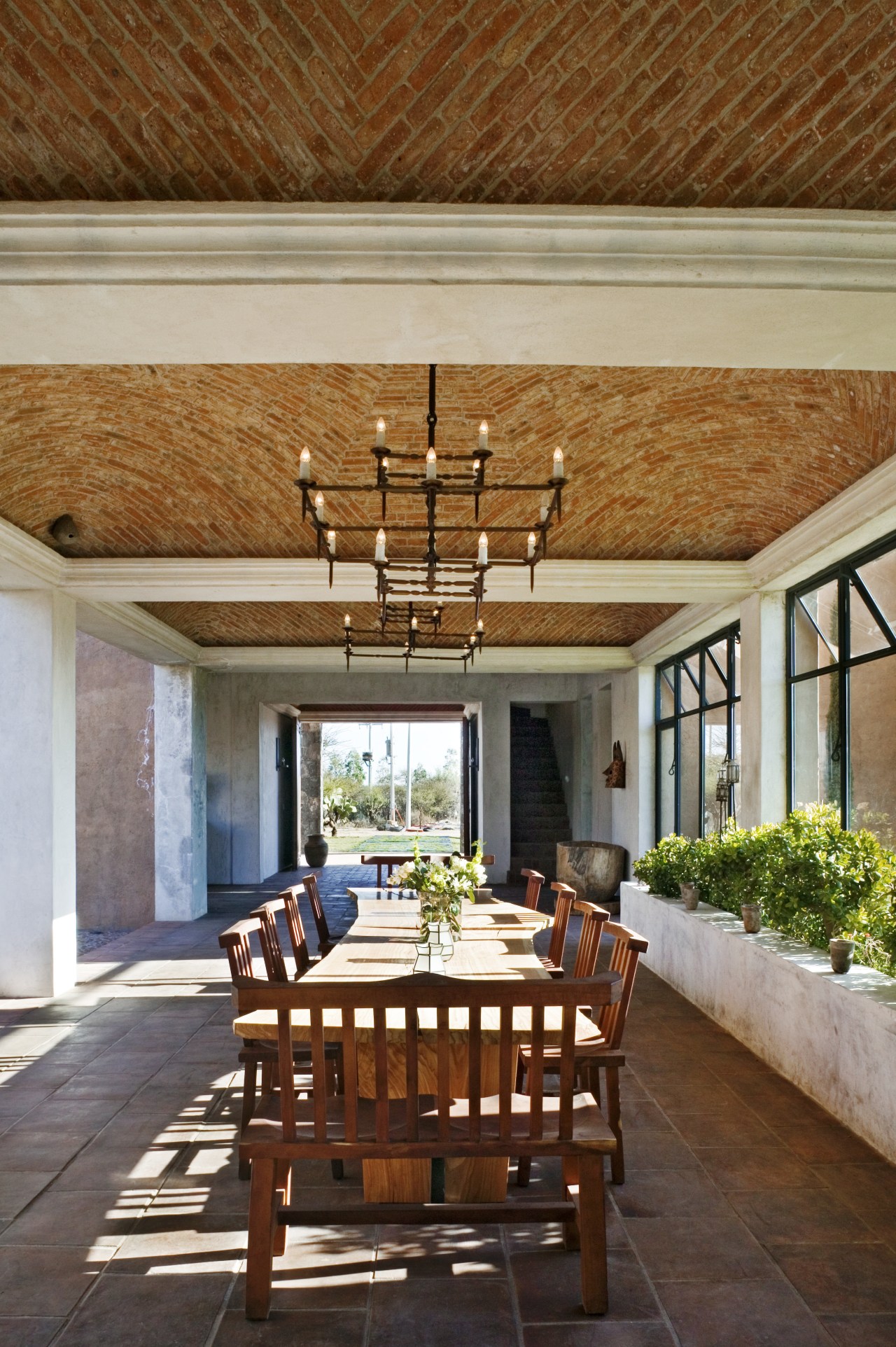 View of dining area. beam, ceiling, dining room, estate, home, interior design, living room, real estate, table, brown, gray