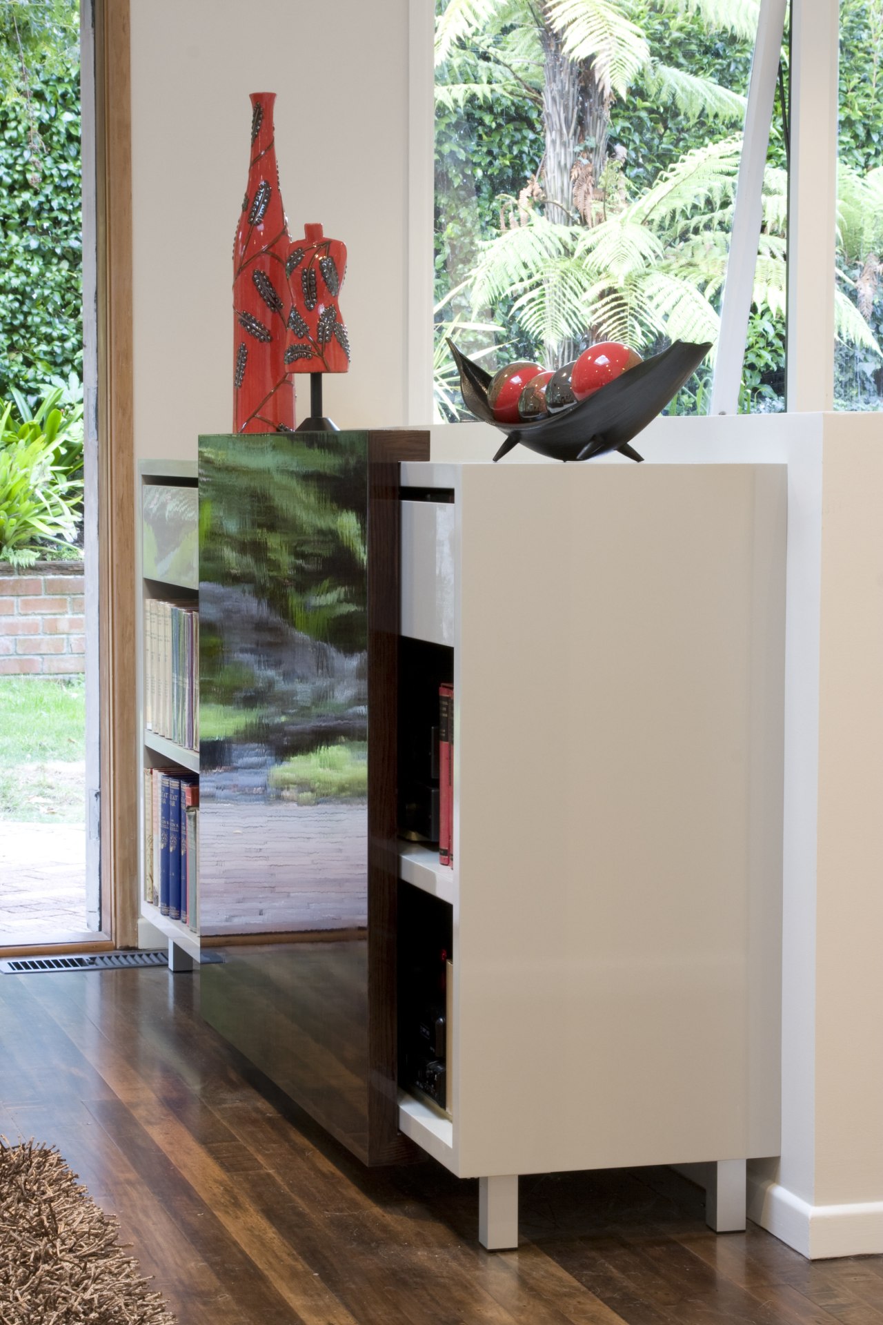 View of a kitchen designed by Toni Roberts chest of drawers, furniture, shelf, shelving, table, gray