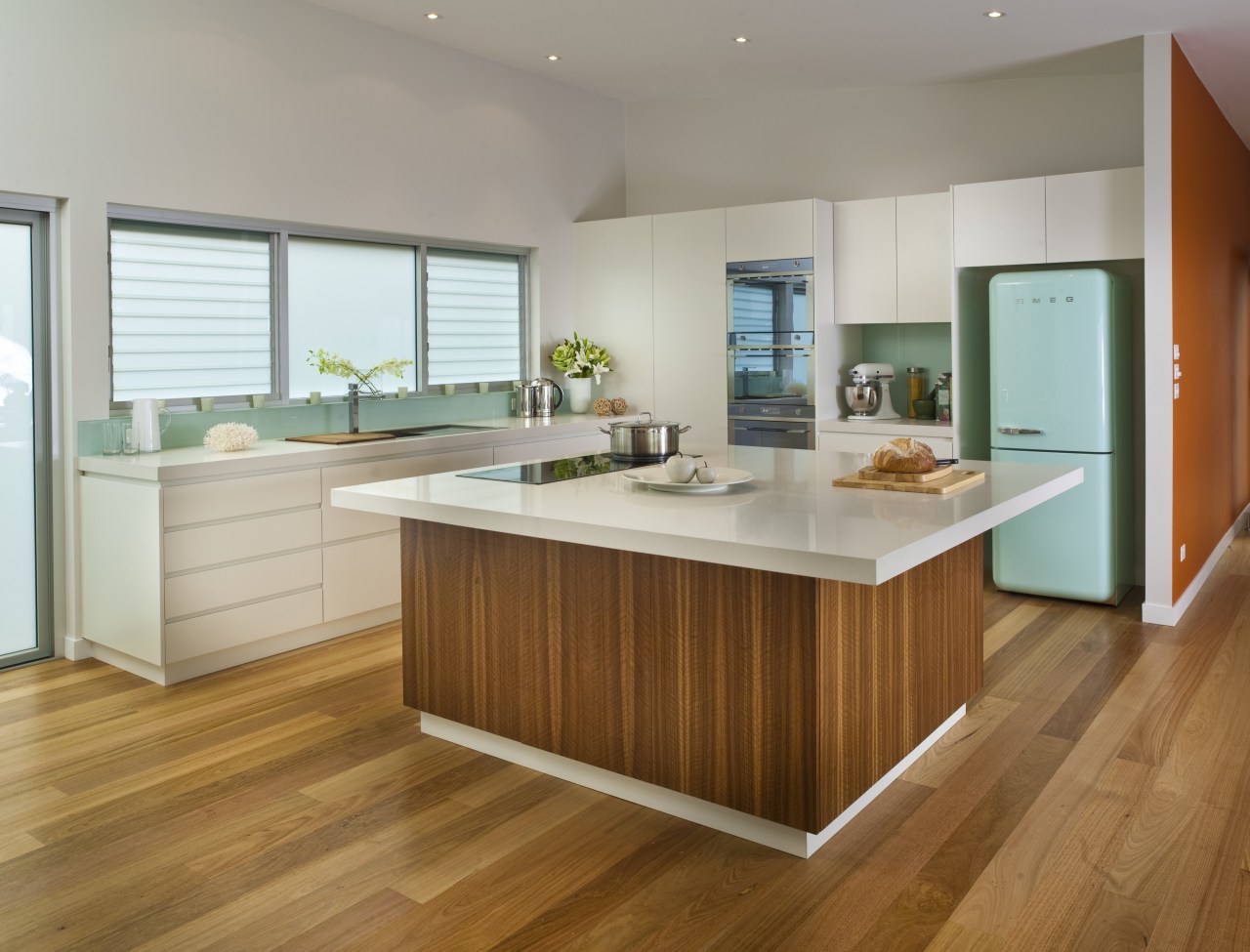 View of contemporary kitchen with light toned benchtops cabinetry, countertop, cuisine classique, floor, flooring, hardwood, interior design, kitchen, laminate flooring, room, wood, wood flooring, gray, brown