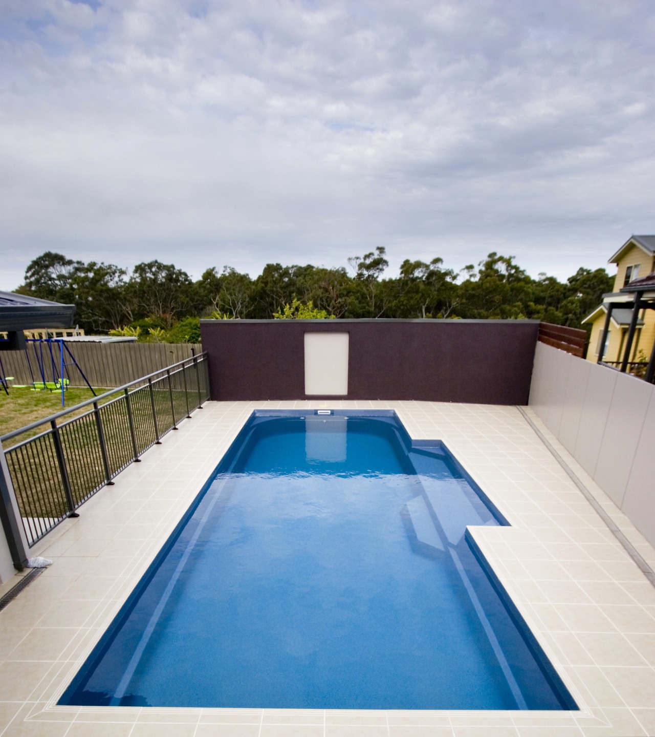 Exterior view of the pool area backyard, estate, house, leisure, property, real estate, sky, swimming pool, water, gray