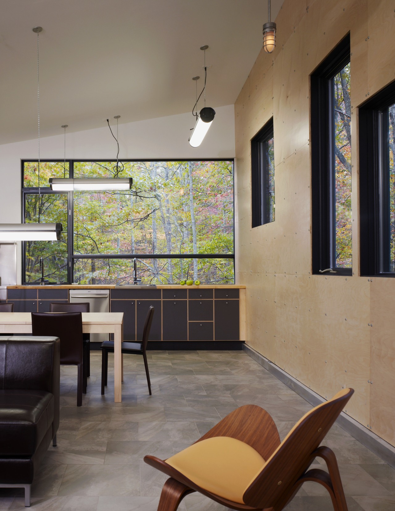 Interior view of this contemporary remodeled home architecture, ceiling, floor, furniture, house, interior design, living room, lobby, table, wall, window, gray