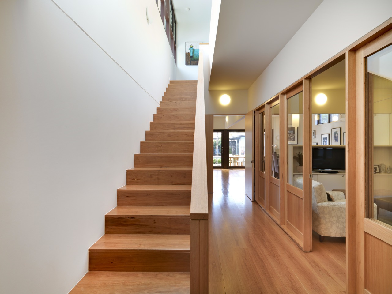 View of this contemporary remodeled lounge area architecture, floor, flooring, handrail, hardwood, home, house, interior design, real estate, stairs, wood, wood flooring, gray