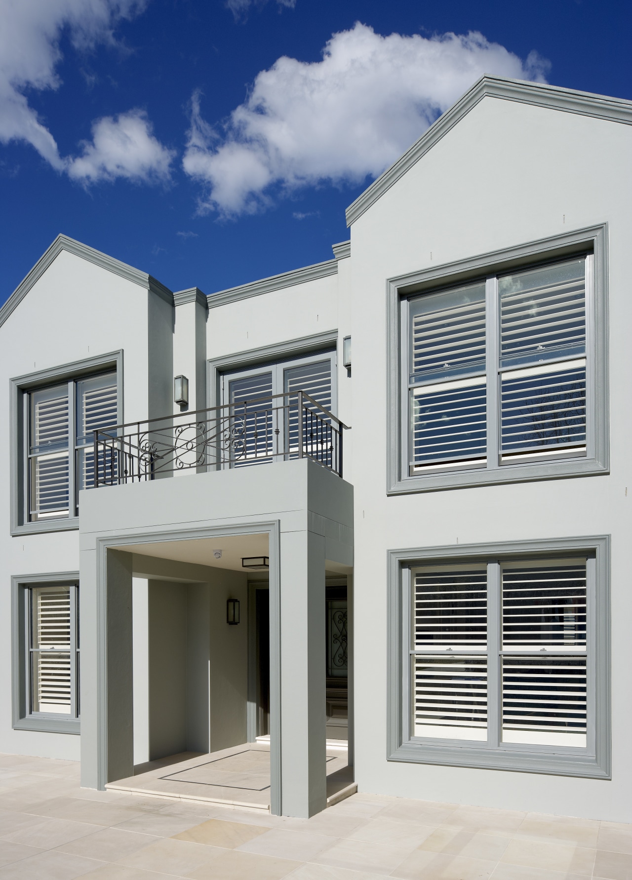 View of this contemporary home architecture, building, elevation, facade, home, house, property, real estate, residential area, window, white, gray