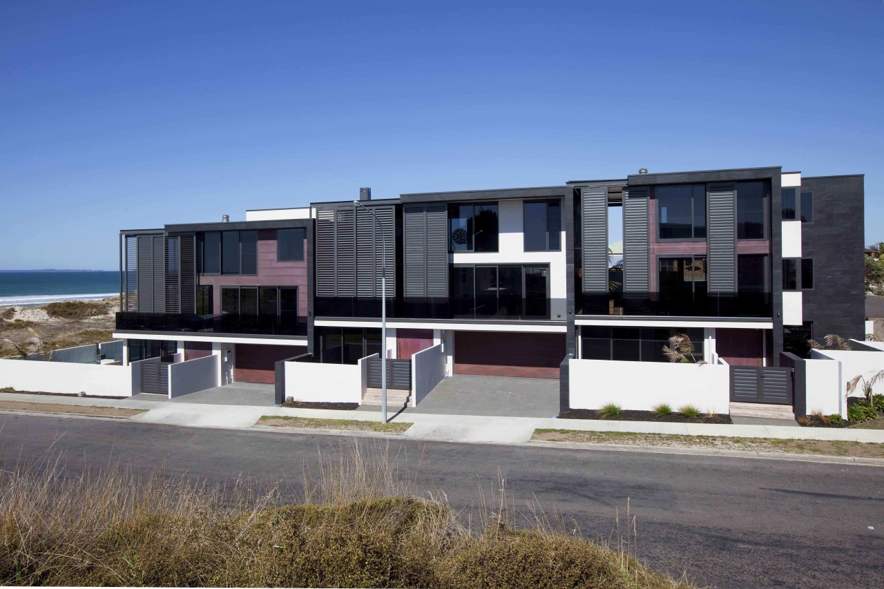 Exterior view of the townhouses apartment, architecture, building, condominium, elevation, facade, home, house, property, real estate, residential area, blue