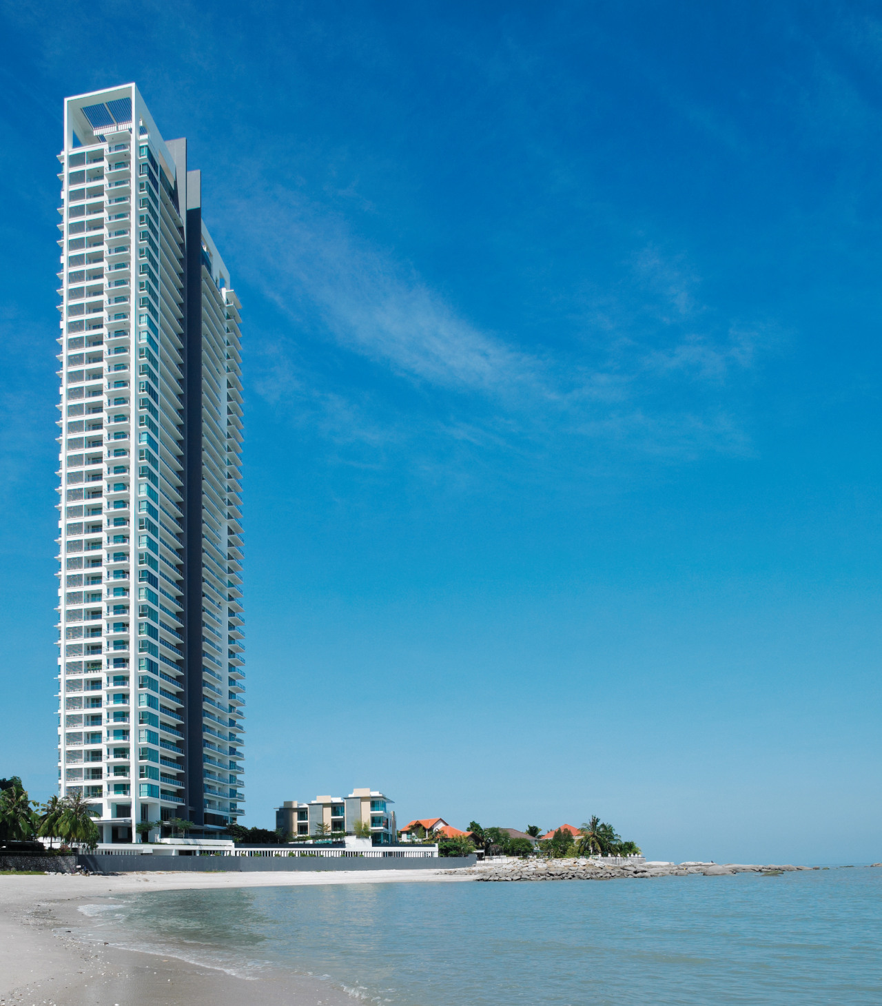 Exterior view of the Springtide Residence on Penang building, city, coast, coastal and oceanic landforms, condominium, daytime, horizon, metropolis, metropolitan area, ocean, real estate, sea, shore, sky, skyline, skyscraper, tower, tower block, teal