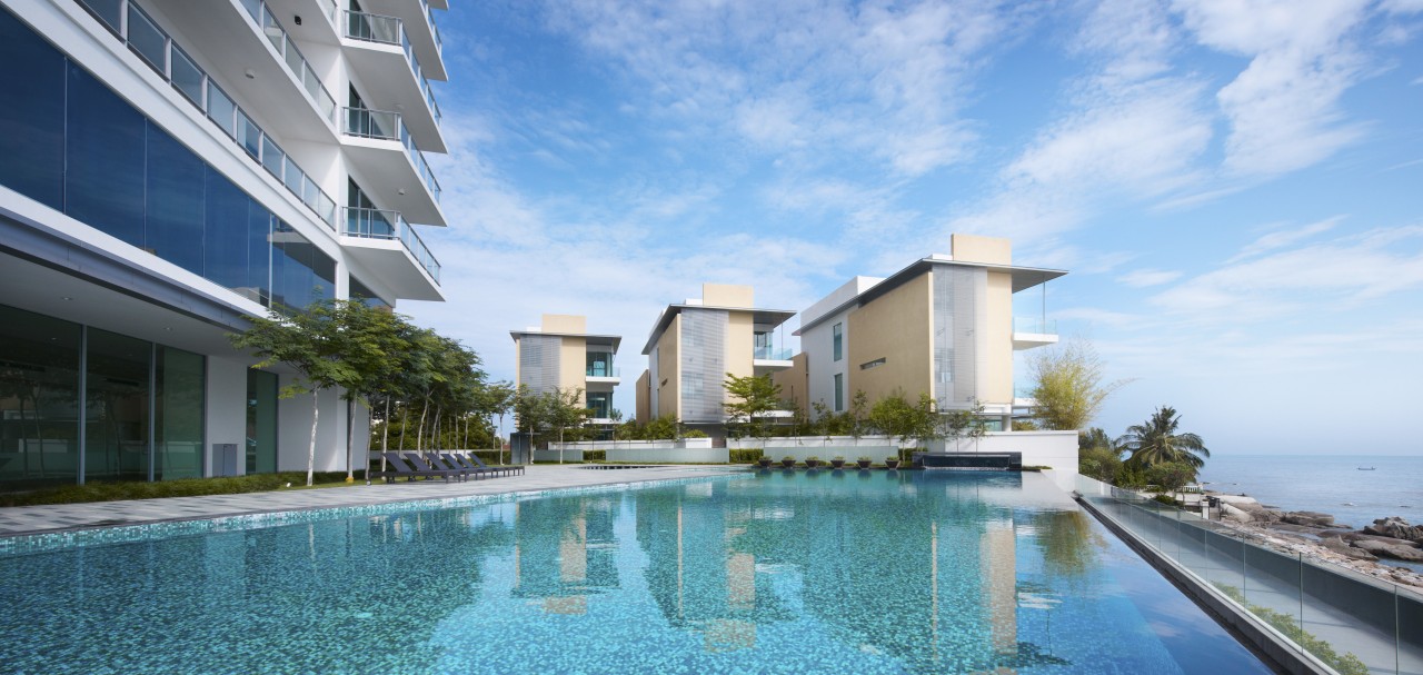 Exterior view of the Springtide Residence on Penang apartment, condominium, estate, home, hotel, leisure, property, real estate, resort, resort town, sky, swimming pool, vacation, villa, teal
