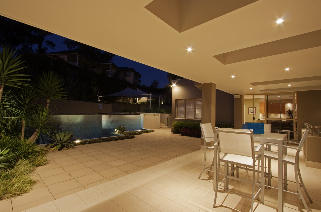 View of this contemporary home by Denton Homes apartment, ceiling, estate, home, house, interior design, lighting, living room, lobby, property, real estate, window, orange, brown