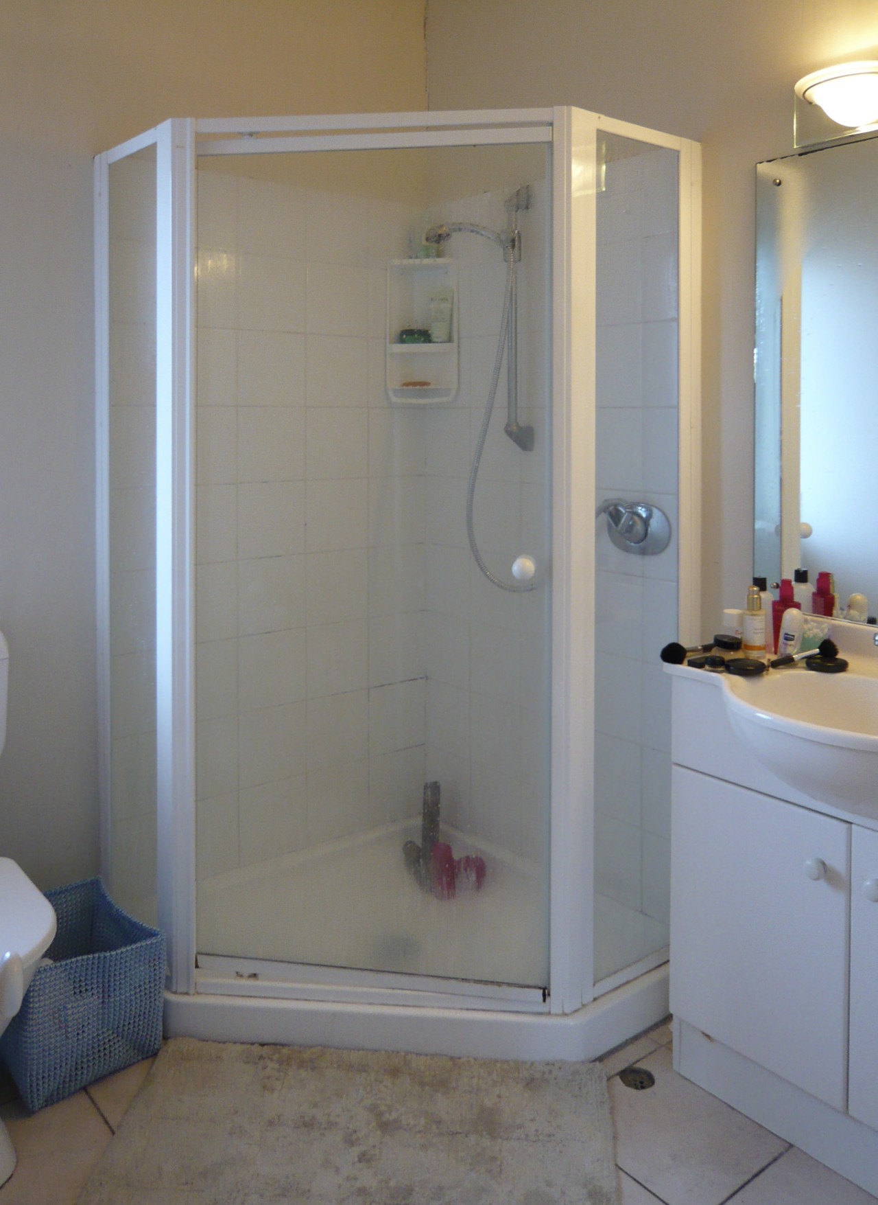 View of bathroom prior to renovations bathroom, door, plumbing fixture, room, shower, gray