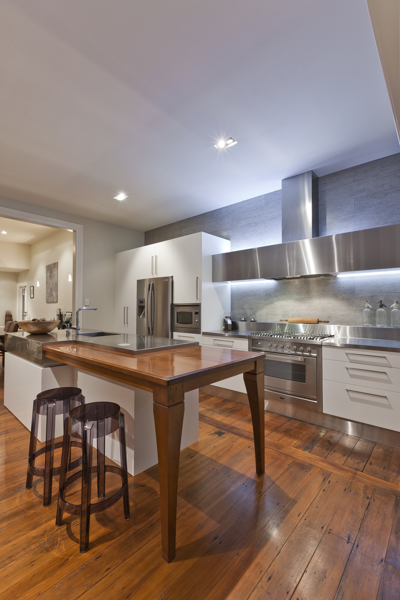 View of contemporary renovated kitchen featuring timber floors, cabinetry, ceiling, countertop, cuisine classique, floor, flooring, hardwood, interior design, kitchen, laminate flooring, real estate, room, wood, wood flooring, gray, brown