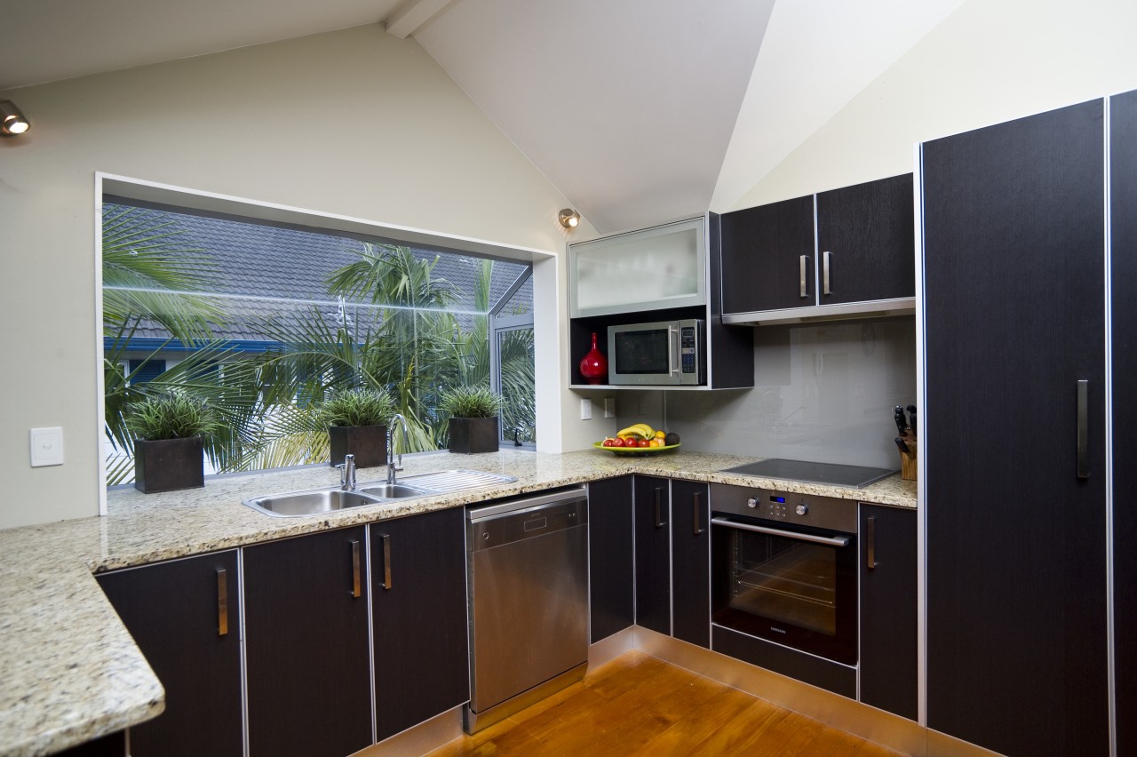 View of the contemporary kitchen countertop, interior design, kitchen, real estate, room, black, gray