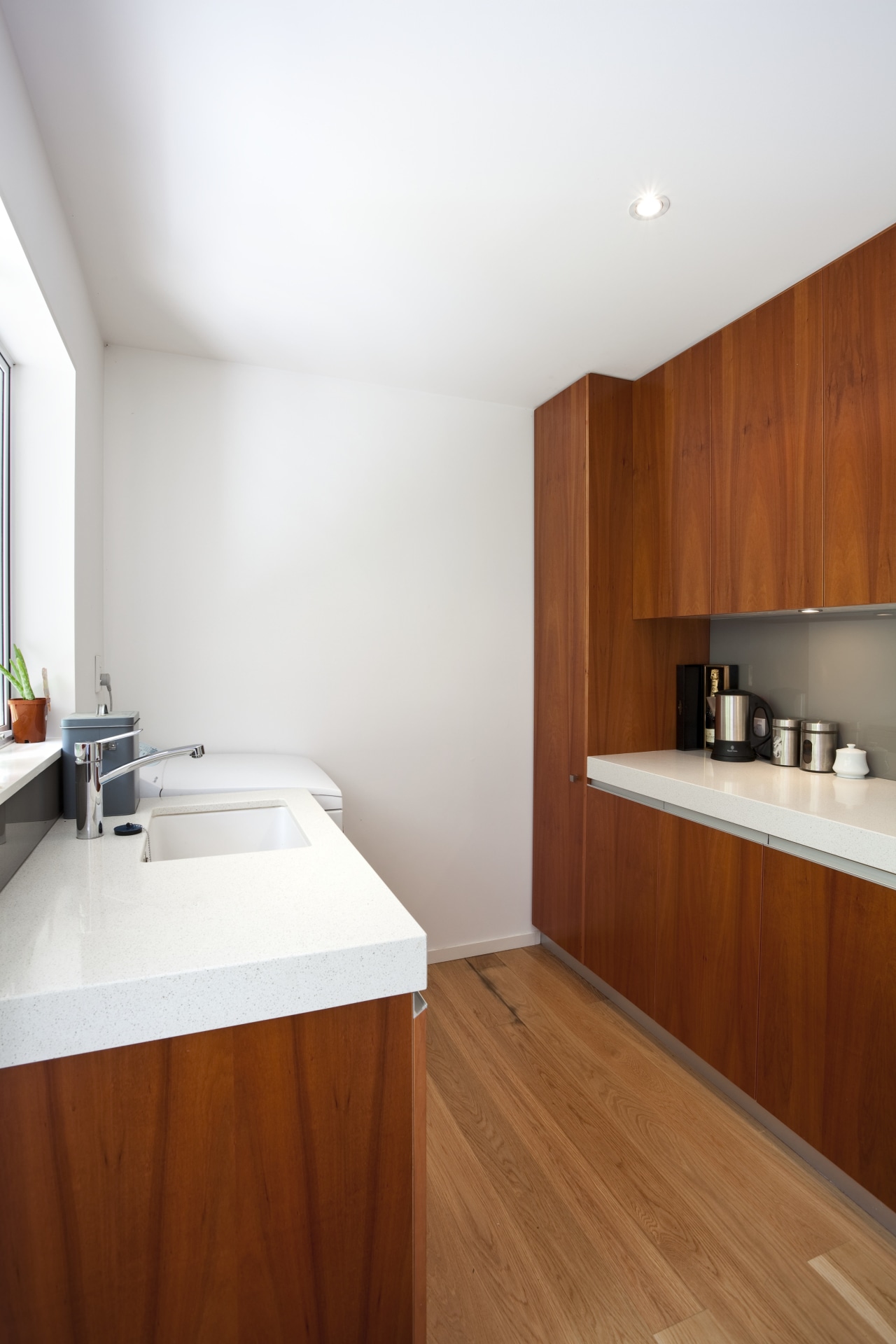 View of kitchen which features oak floors, CaesarStone architecture, bathroom, countertop, floor, flooring, hardwood, house, interior design, kitchen, real estate, room, sink, wood, wood flooring, white, brown