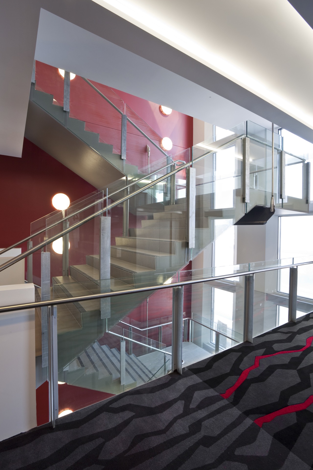 View of stainless steel handrails at the newly apartment, architecture, building, ceiling, daylighting, glass, handrail, interior design, stairs, structure, gray