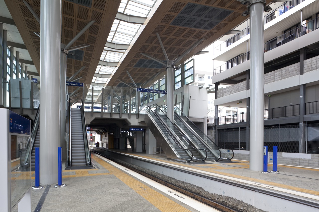 View of the railway tracks at the upgraded building, metro station, metropolis, metropolitan area, public transport, rapid transit, structure, track, train station, transport, gray, black