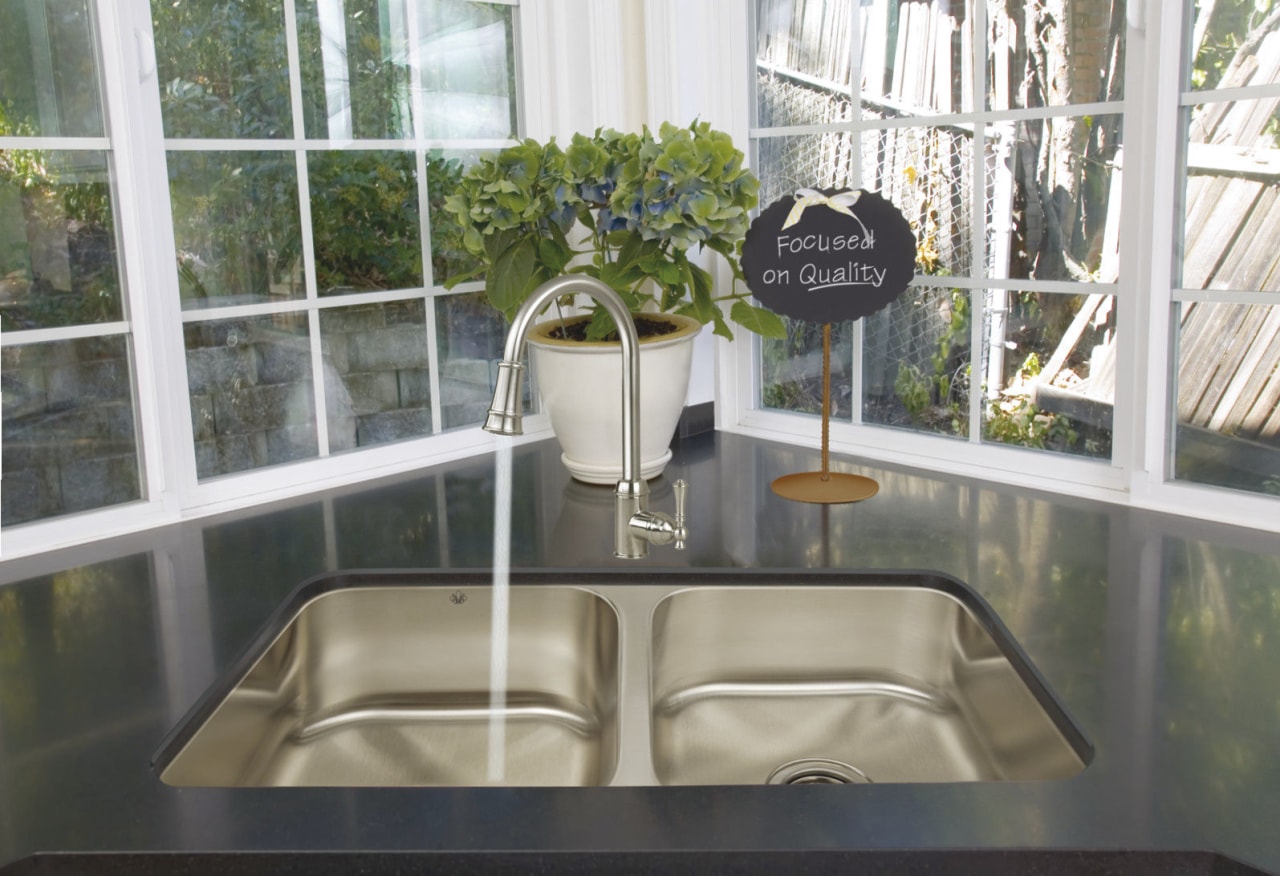 View of a kitchen which features a stainless home, interior design, property, window, gray, white