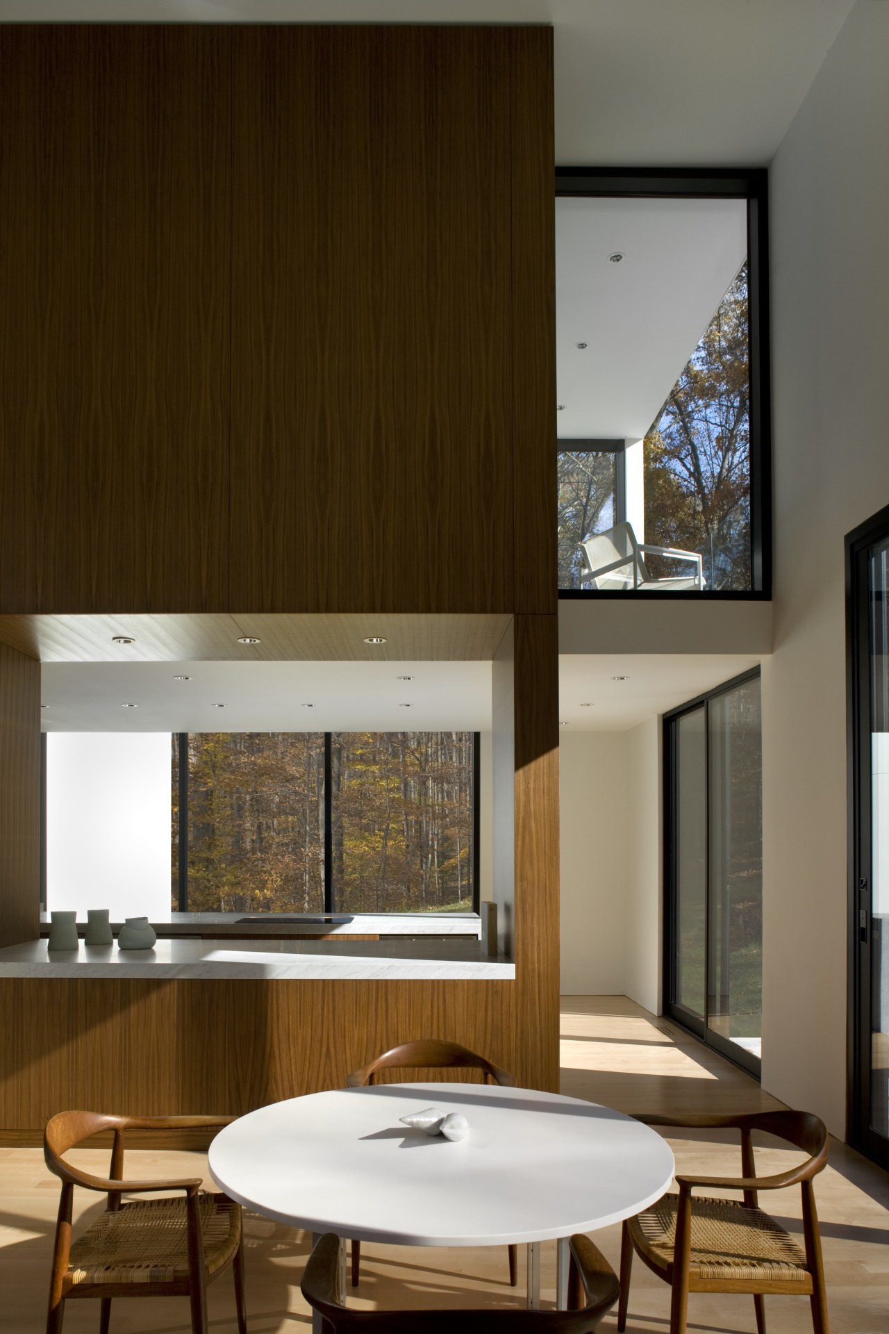 View of dining area with maple flooring and architecture, ceiling, furniture, house, interior design, table, window, brown