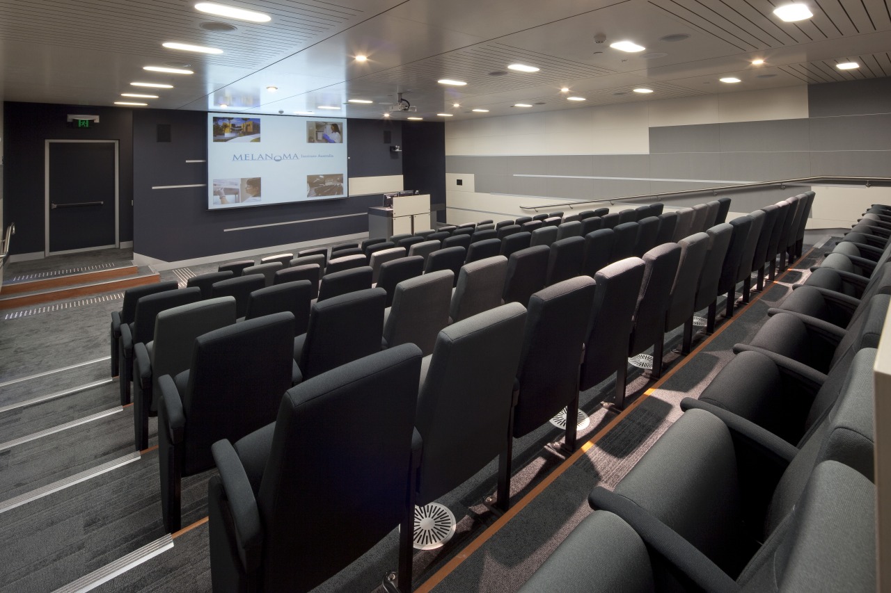 Interior view of the Poche Centre which features auditorium, conference hall, black, gray
