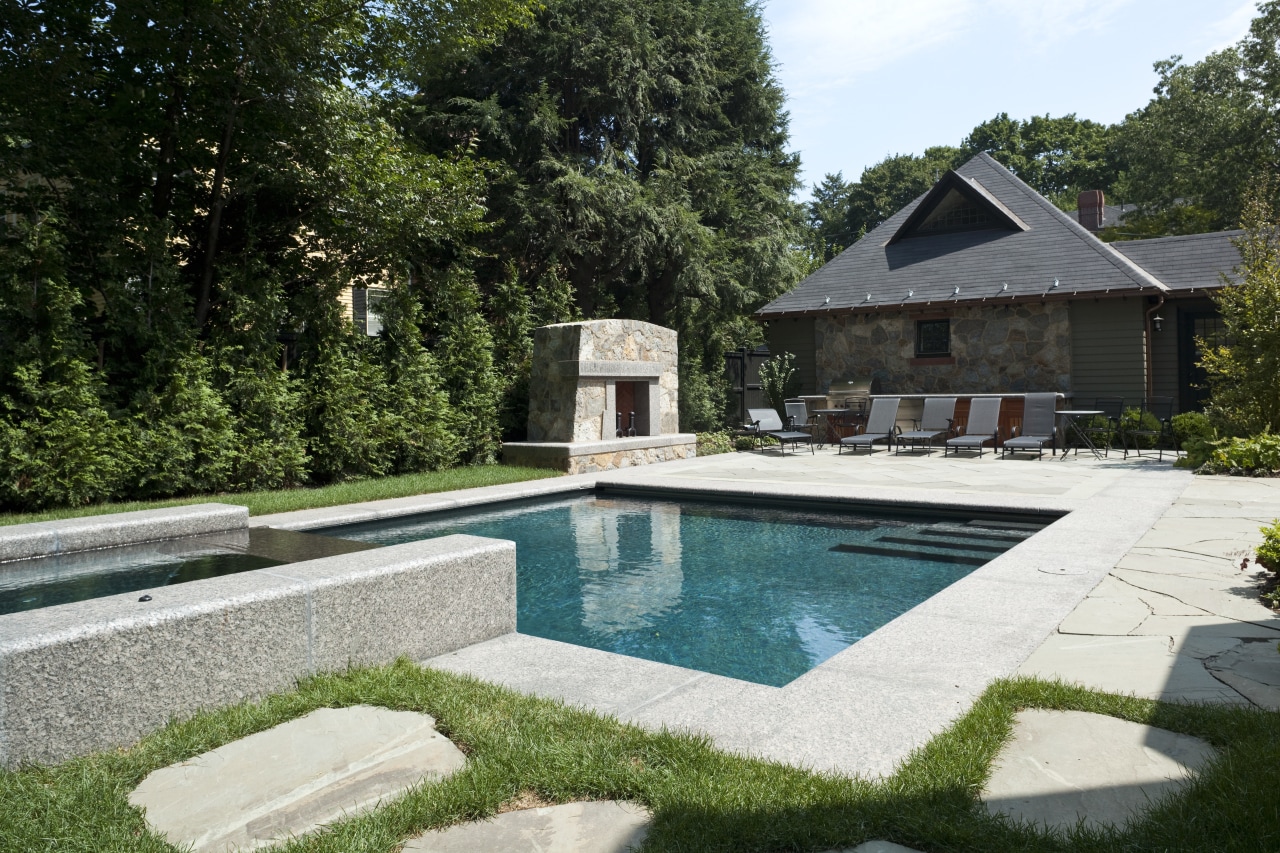 View of outdoor pool area with water feature backyard, estate, garden, home, house, landscape, landscaping, outdoor structure, property, real estate, swimming pool, villa, water feature, yard, white