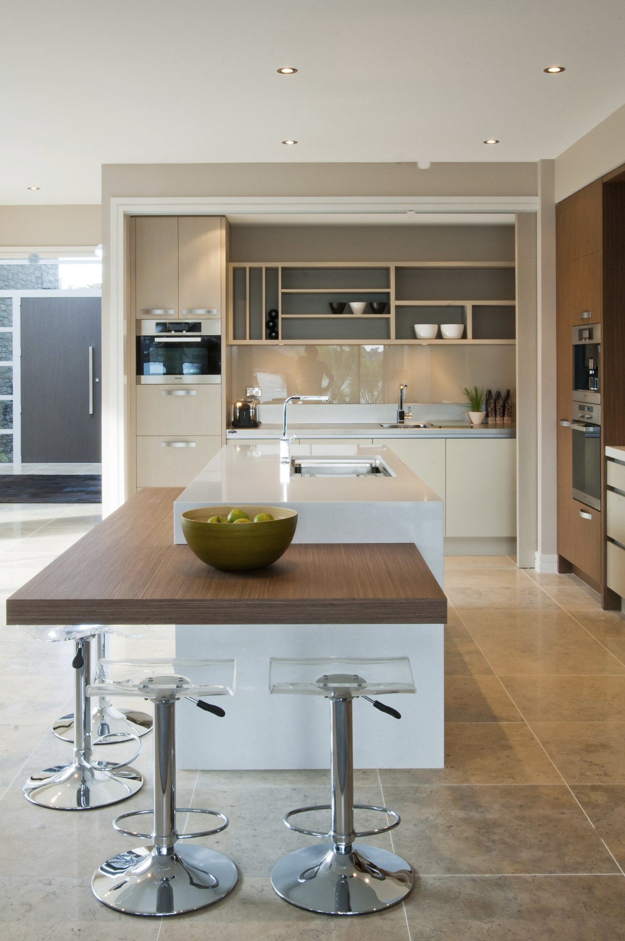 View of a kitchen designed by Suyin of countertop, cuisine classique, floor, flooring, interior design, kitchen, table, wood flooring, gray